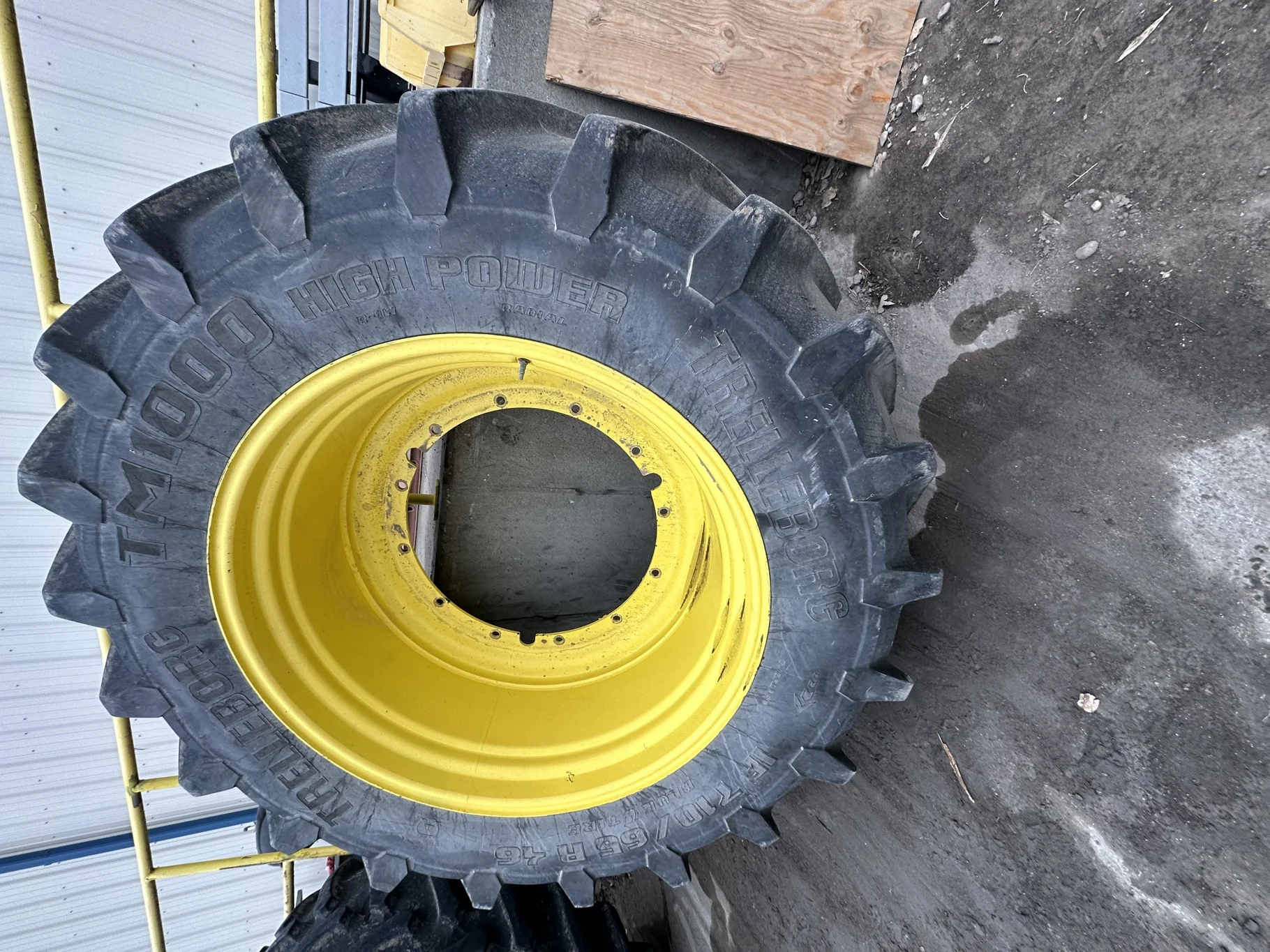 Used 90% IF710/65R46 Trelleborg TM1000 High Power R-1W 183D TL on a 25 x 46 JD Yellow 12 Bolt Spraye