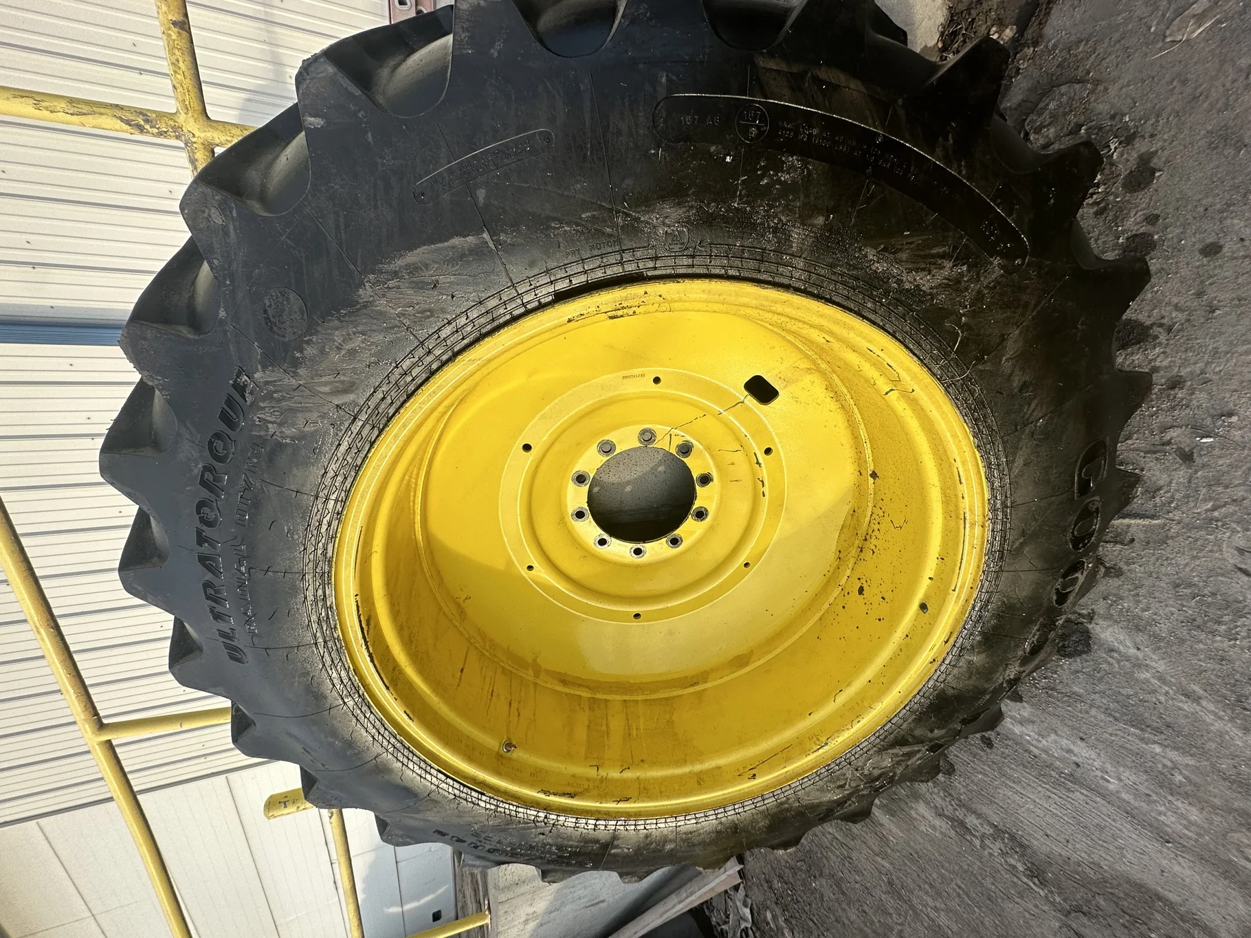 Used 85% 520/85R42 Goodyear Ultra Torque Radial R-1 (157A8) (Lug cuts, stubble) TL on a 18 x 42 JD Y