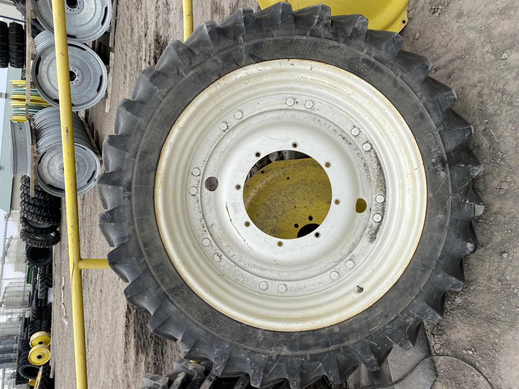 Used 70% 320/85R38 Michelin AgriBib Row Crop R-1W (143A8/143B) TL on a 10 x 38 New Holland White Waf image 2