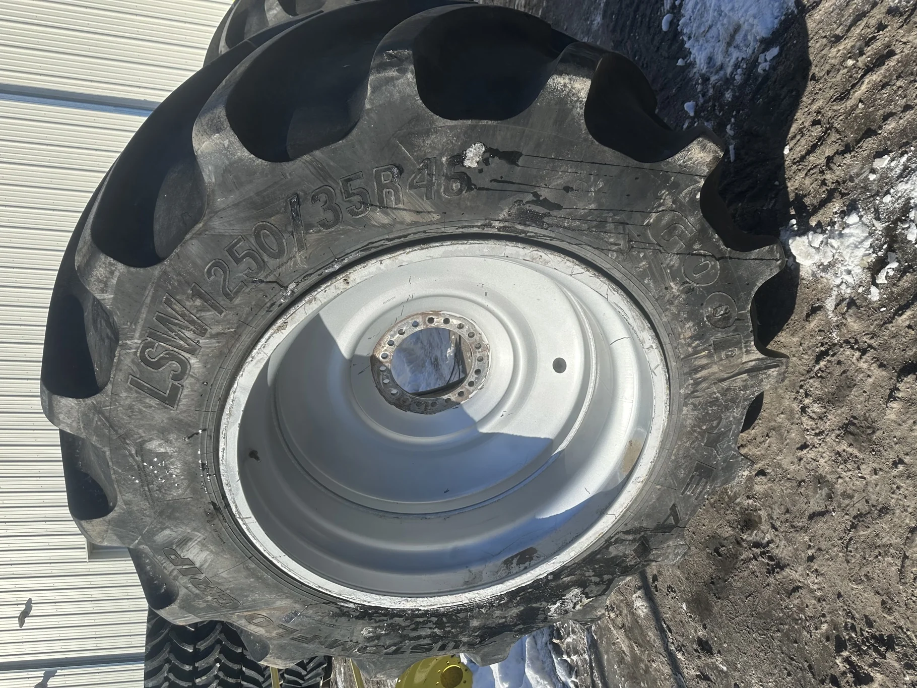 Used 75% LSW1250/35R46 Goodyear Optitrac R-2 (202D) TL on a 44 x 46 Case Silver 20 Bolt Combine Whe