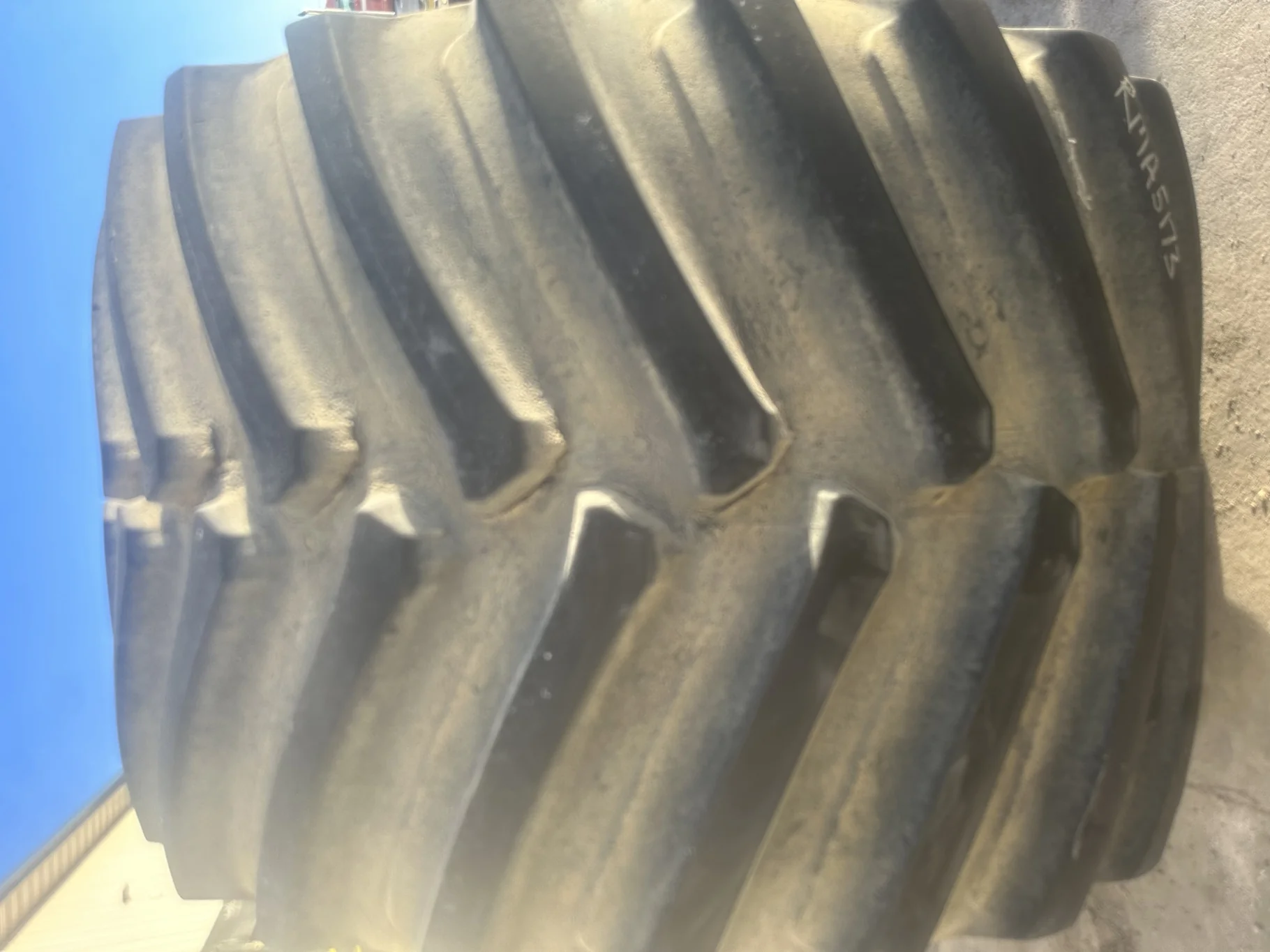 Used 90% IF1250/50R32 CFO Firestone Radial Deep Tread 23 R-1W (201B) TL on a 44 x 32 JD Yello image 4