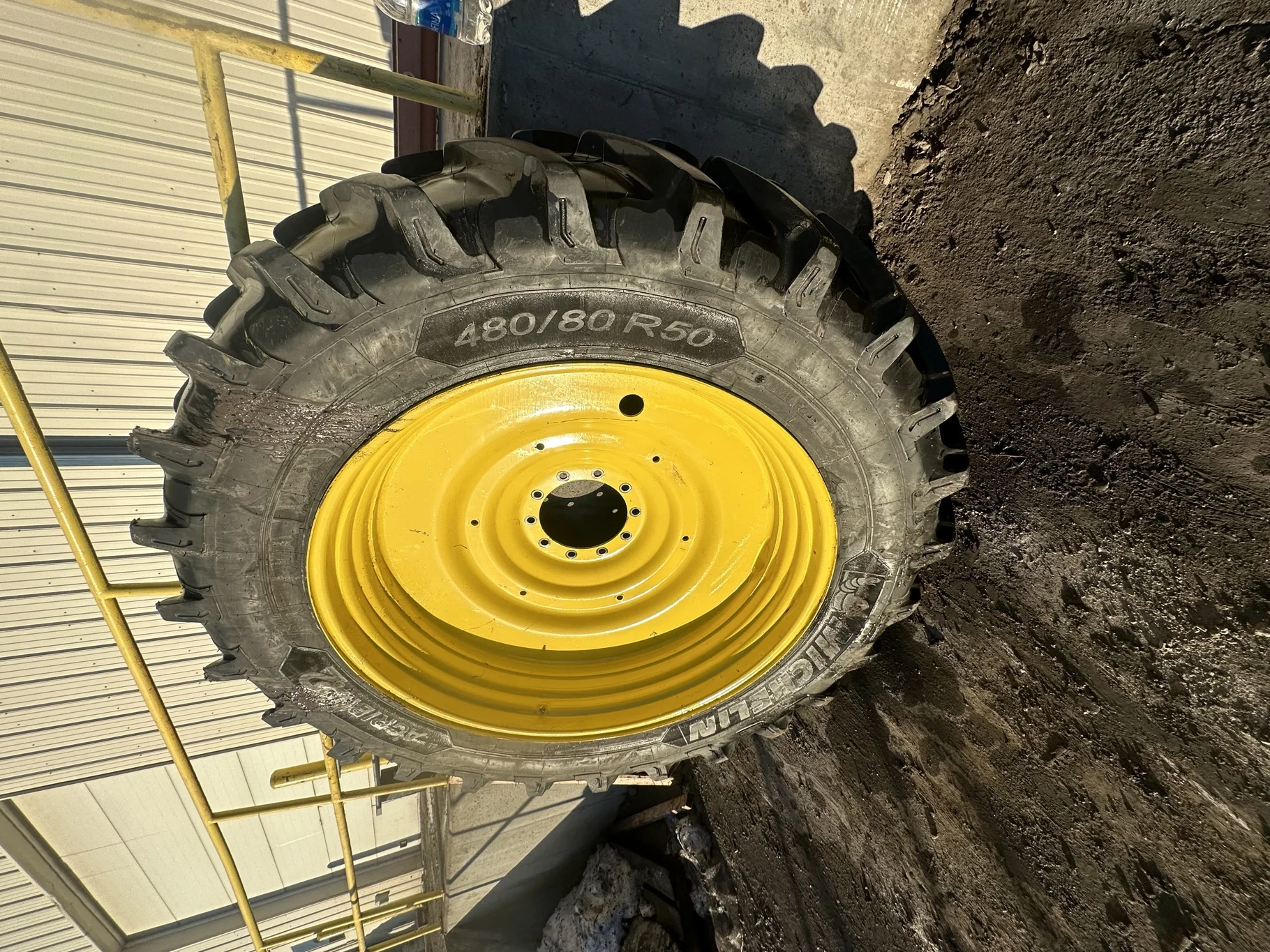 Used 90% 480/80R50 (18.4R50) Michelin AgriBib 2 R-1W 159A8/159B TL on a 15 x 50 JD Yellow 10 B