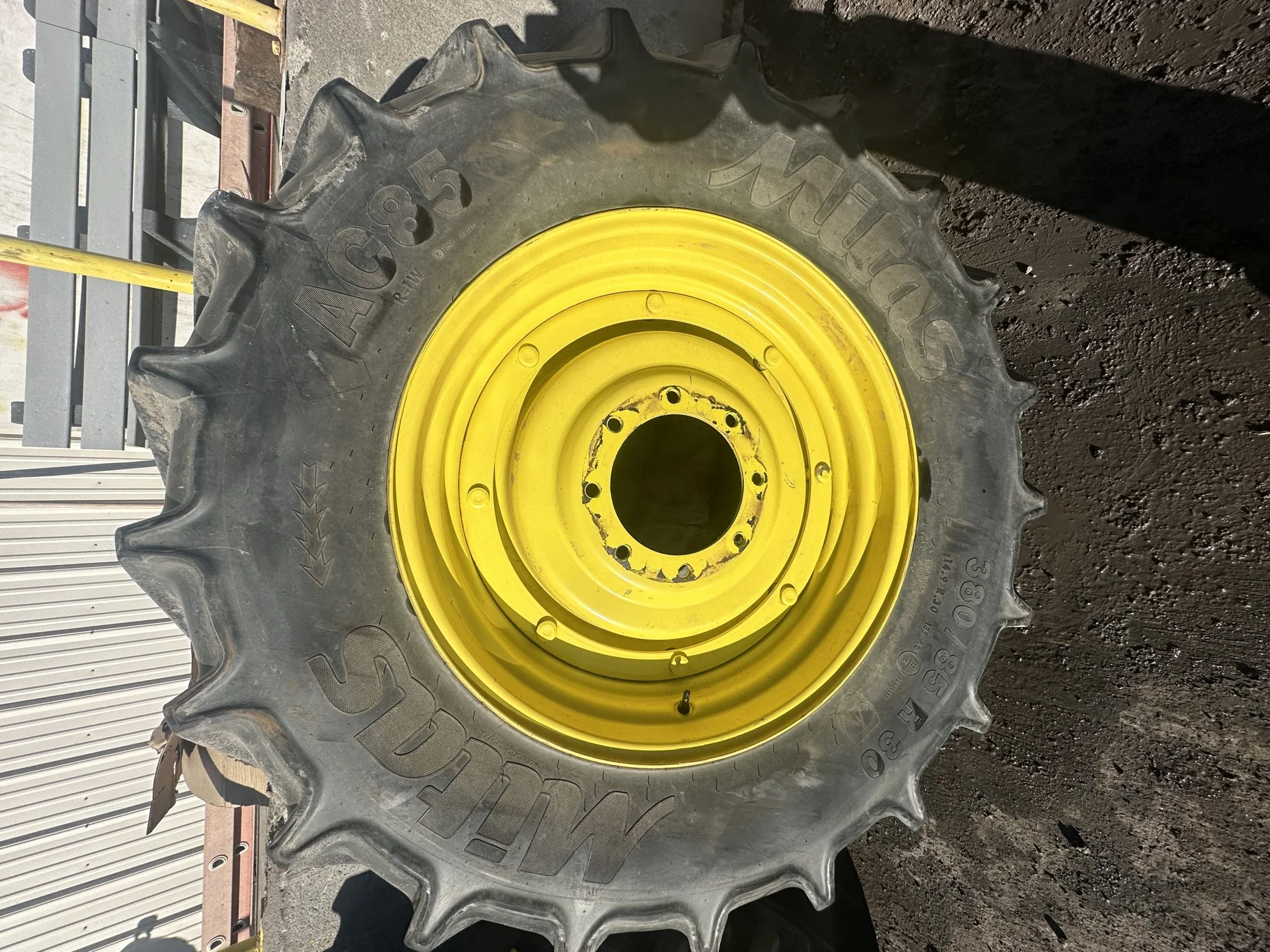 Used 80% 380/85R30 (14.9R30) Mitas AC85 135A8/135B TL on a 12 x 30 JD Yellow 8 Bolt Stub Disc image 2
