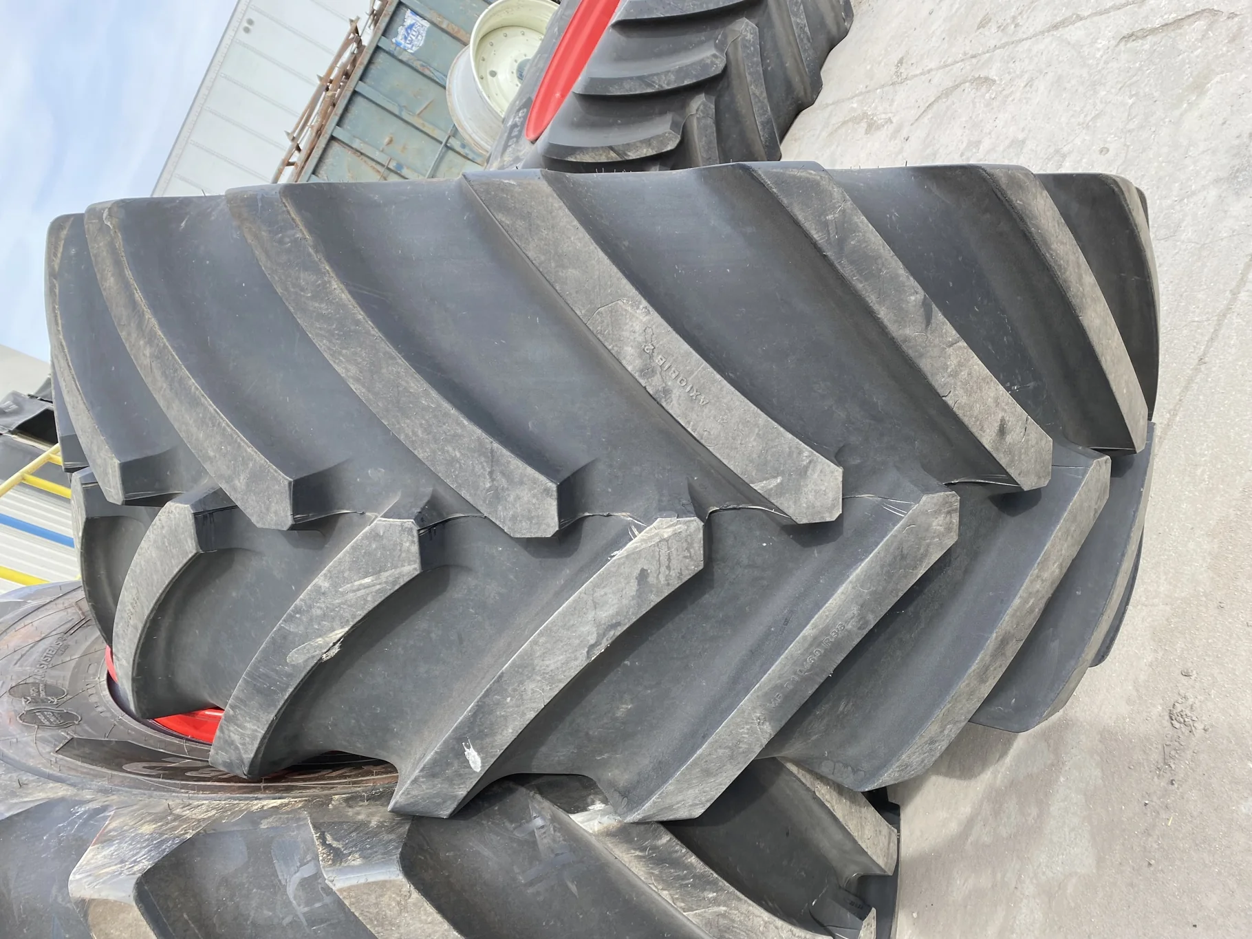 Used 95% VF710/60R38 Michelin AxioBib2 R-1W 174D TL on a 25 x 38 Fendt Red 12 Bolt (.906") Straight image 3