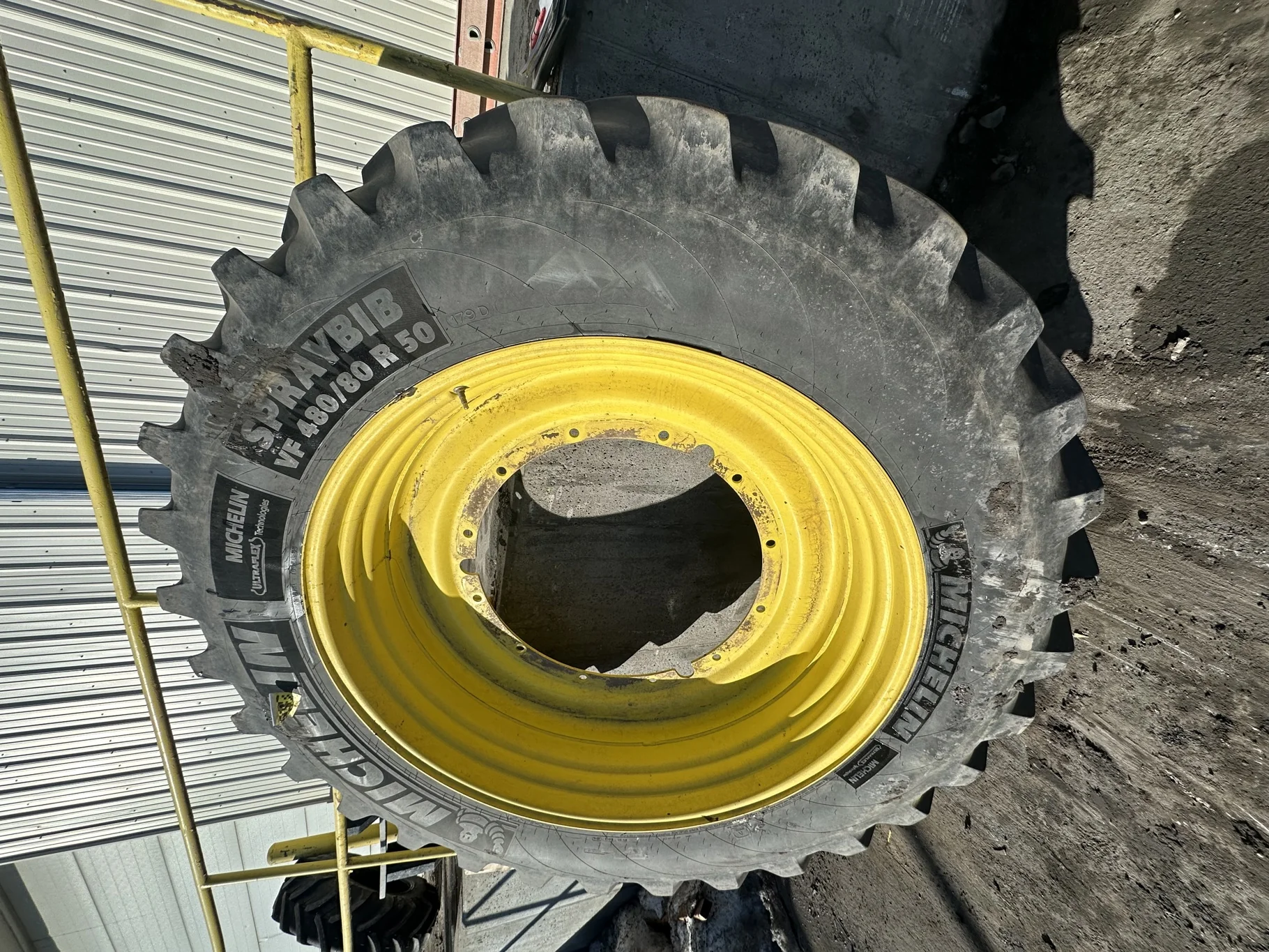 Used 80% VF480/80R50 Michelin SprayBib R-1W 179D TL on a 15 x 50 JD Yellow 12 Bolt Stub Disc (