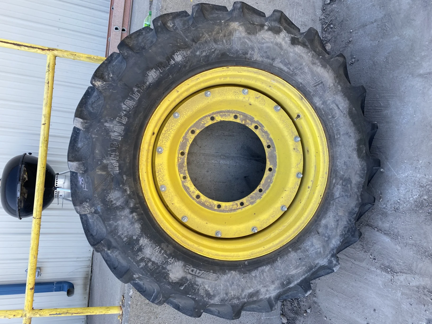 Used 85% VF 420/85R34 Firestone Radial All Traction DT (157B) on 15 x 34 12 bolt wheel with 12 bolt
