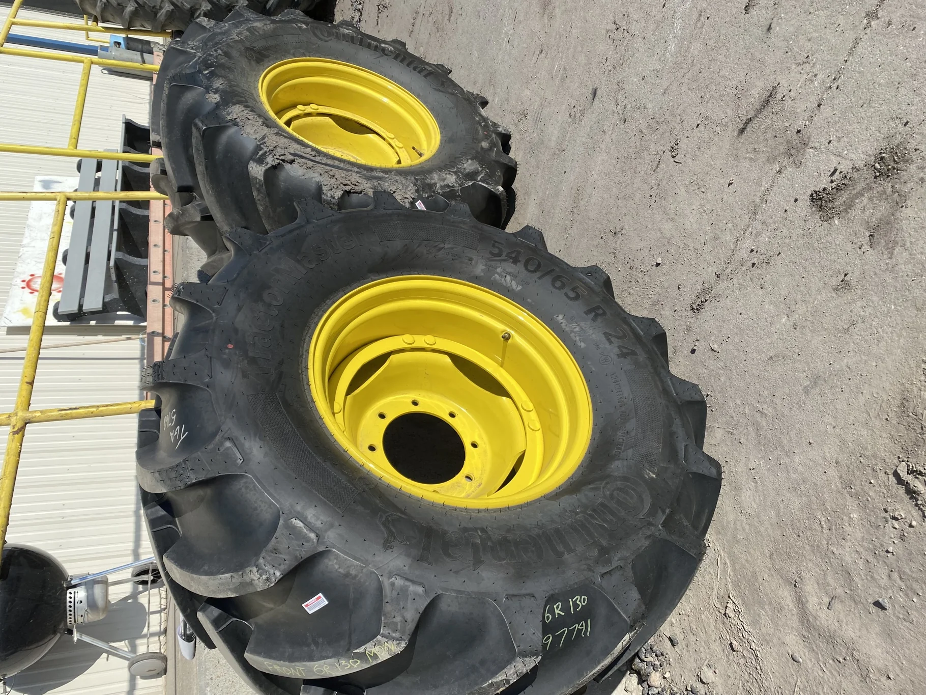 Used 98% 540/65R24 Continental TractorMaster R-1W 140D on a 16 x 24 JD Yellow 8 bolt wheel wit image 2