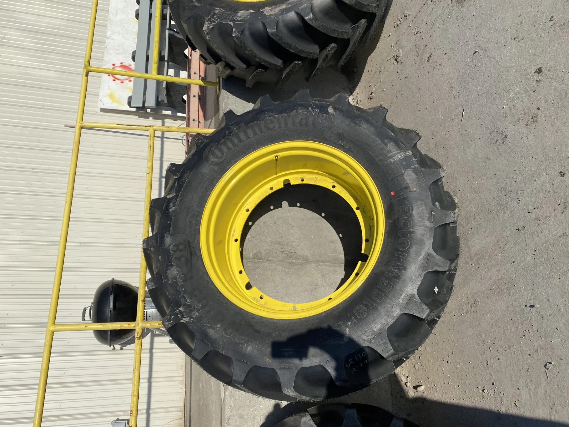Take Off 600/65R38 Continental TractorMaster R-1W 153D  TL on a 18 X 38 JD Yellow 12 Bolt (.93