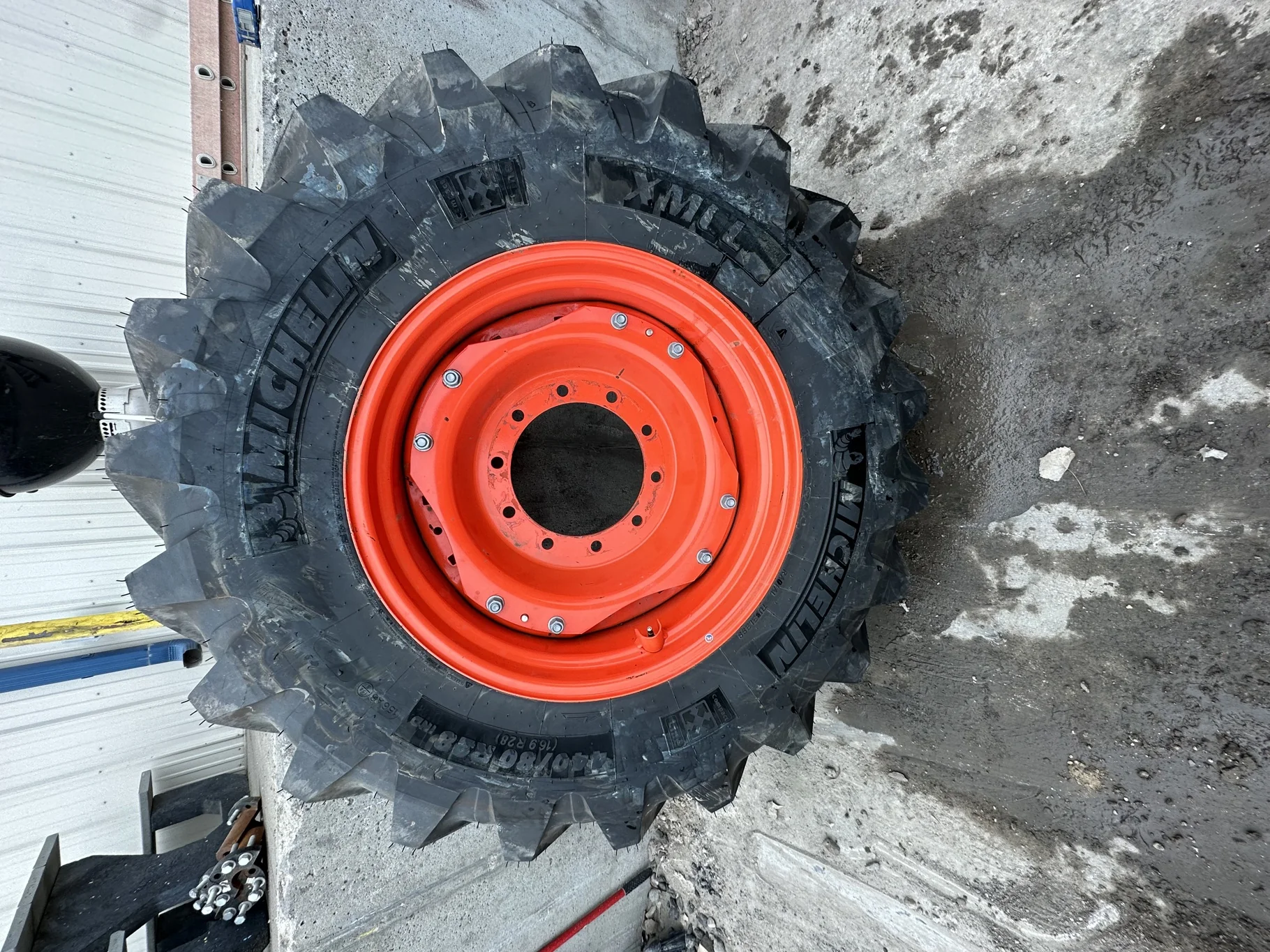 Used 440/80/R28 Michelin XMCL (156B) on 15 x 28 Kubota orange wheels (10-13-11)(Little bit of road w image 2