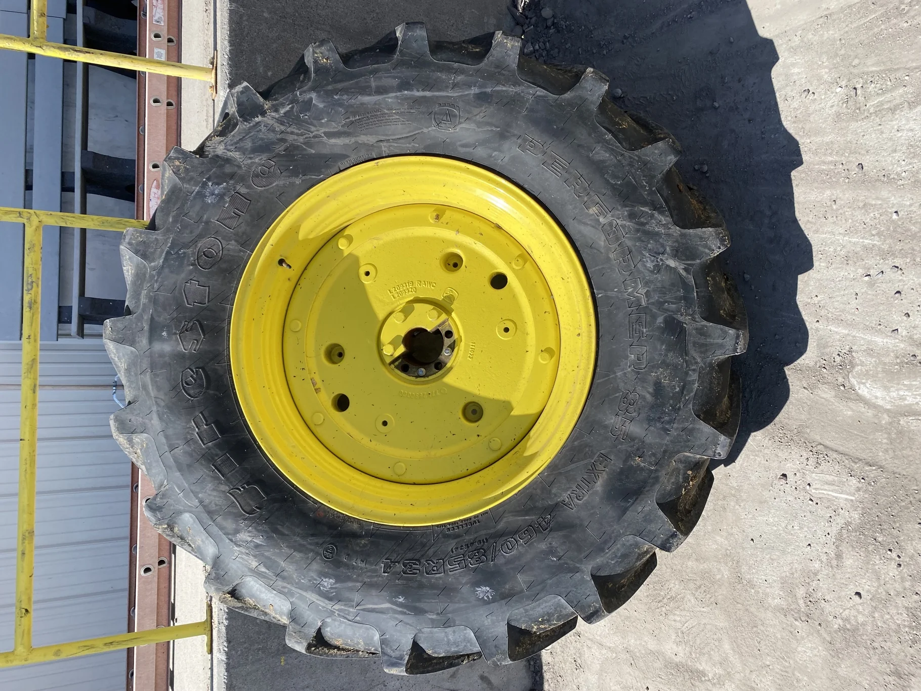 Used 75% 460/85R34 Firestone Performer 85 Extra R-1W (147D) TL on a 15 x 34 Manheim stub disc wheel