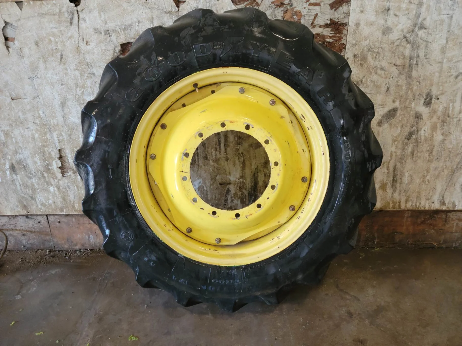 Used 45% 380/85R34 Goodyear Super Traction Radial DT800 on a 13 x 34 JD Yellow 12 Bolt Waffle