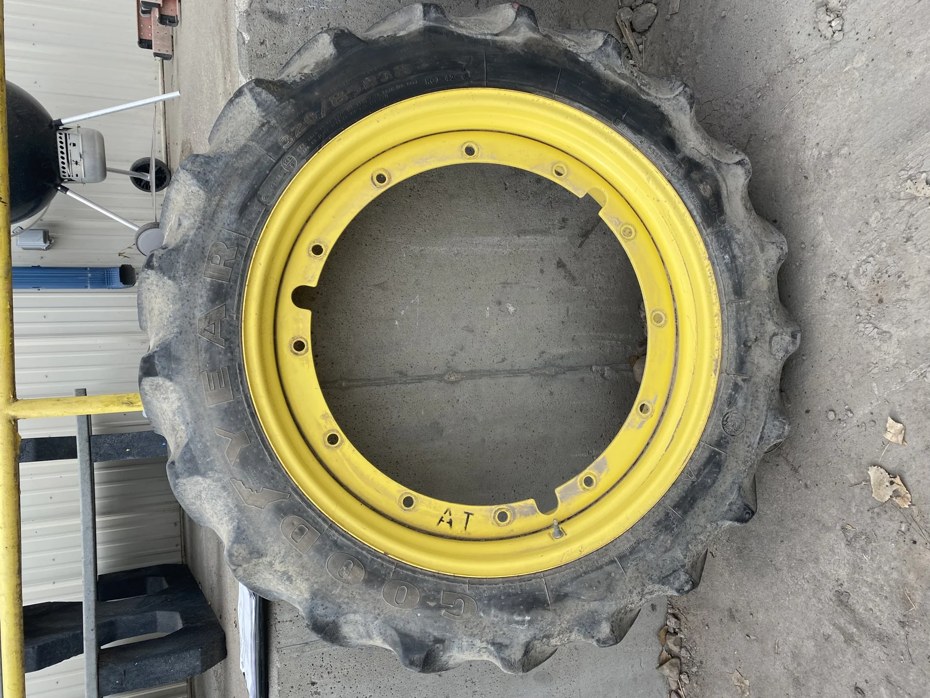 Used 40% 320/85R38 Goodyear Super Traction Radial (142D) R-1W TL on 10 x 38 John Deere Yellow Stub D