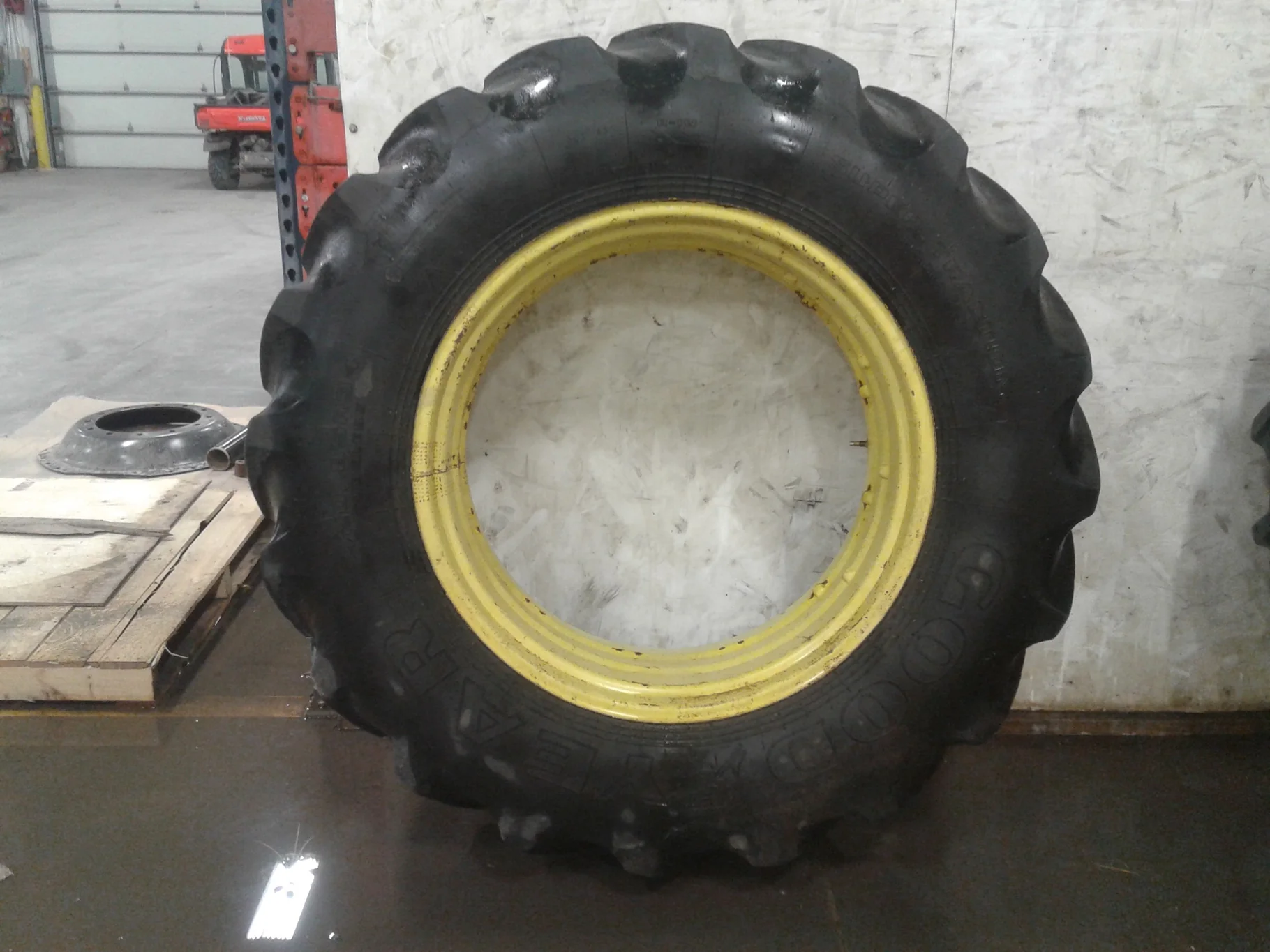 Used 65% 420/85R34 Goodyear STR R-1W (147B) on a 15 x 34 JD Yellow Rim