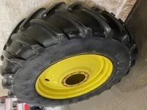 Used 50% 600/65R38 Michelin XM108 on 18 x 38 JD Yellow 10 Bolt Dual - lug cuts image 2