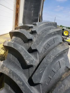 Used 80% 600/65R38 Petlas TA-110 on 18 x 38 JD 10 Bolt Dual - sidewall cuts image 2