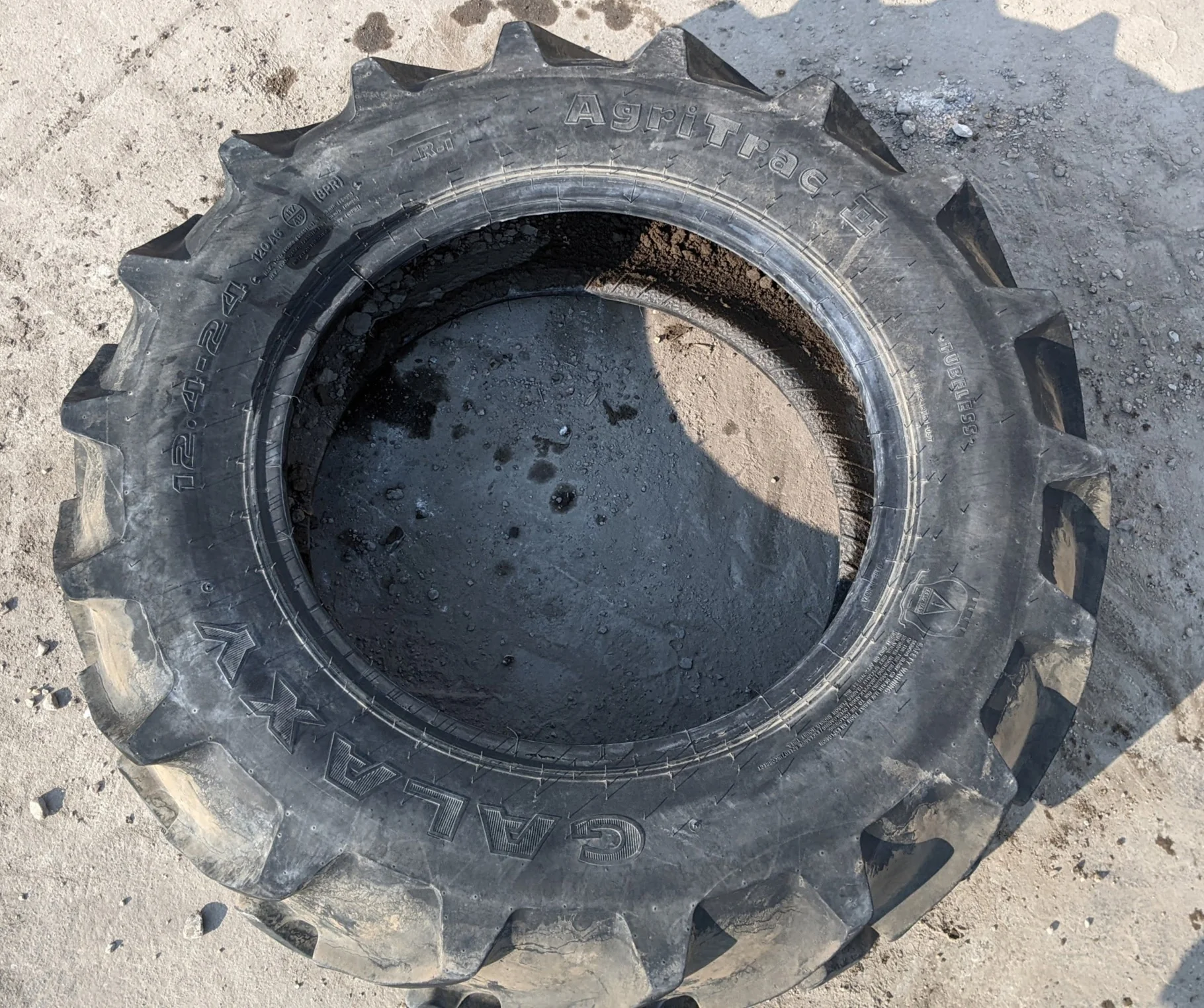 Used 75% 12.4-24 Galaxy Agri Trac II R-1 D(8Ply)(uneven wear, road wear, cuts between lugs, lug cuts