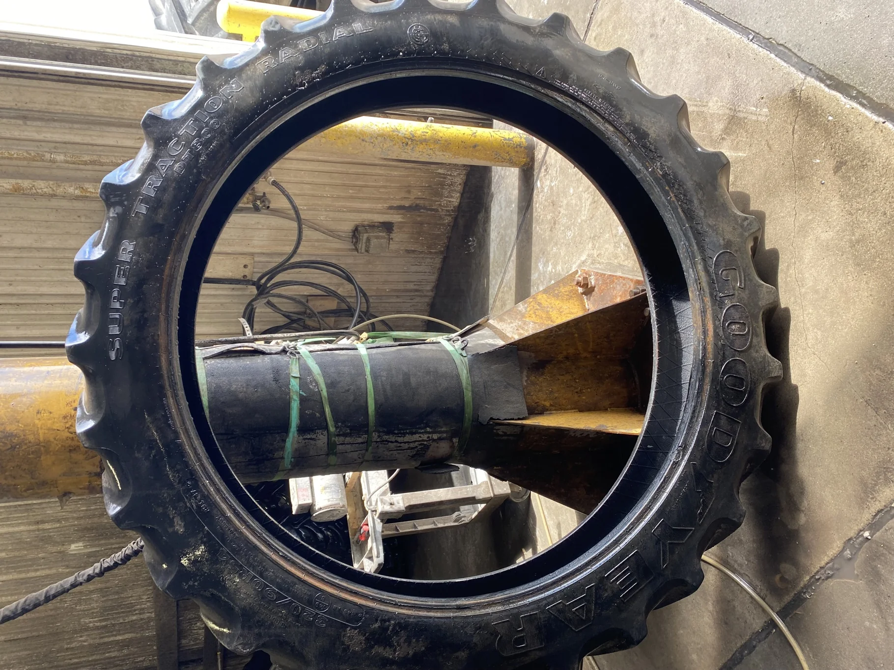 Used 50% 320/90R54 Goodyear Super Traction Radial DT 800 149AB TL (Lug Cuts, Chunks Missing On Lugs,