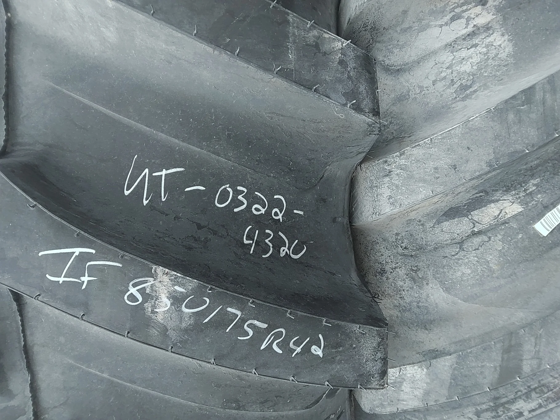 Used 100% IF850/75R42 CFO Firestone Radial Deep Tread 23 R-1W 186B TL - cuts on sidewall