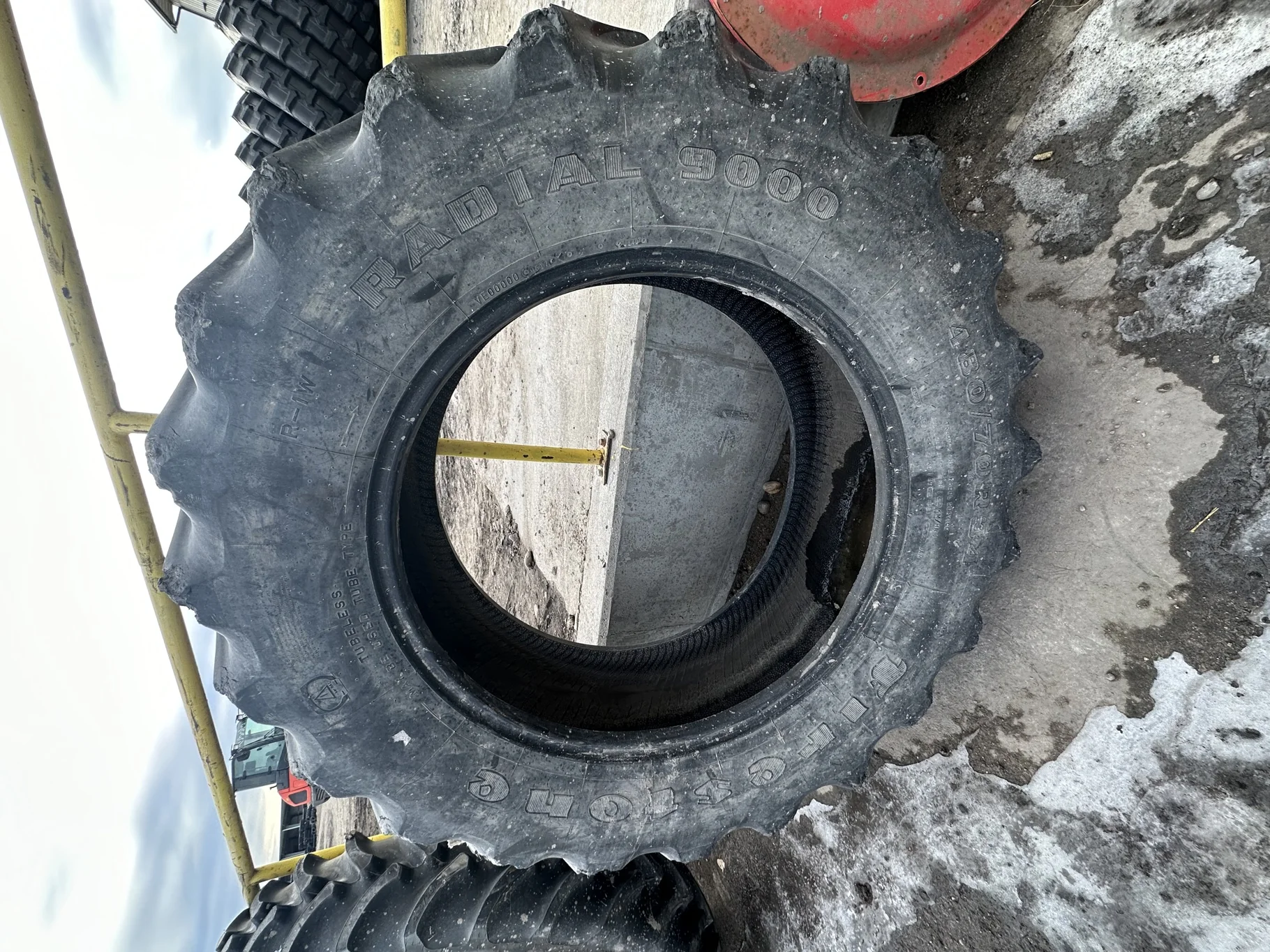 Used 85% 480/70R34 Firestone Radial 9000 R-1W (155B) TL (chunks missing on edge of lugs)