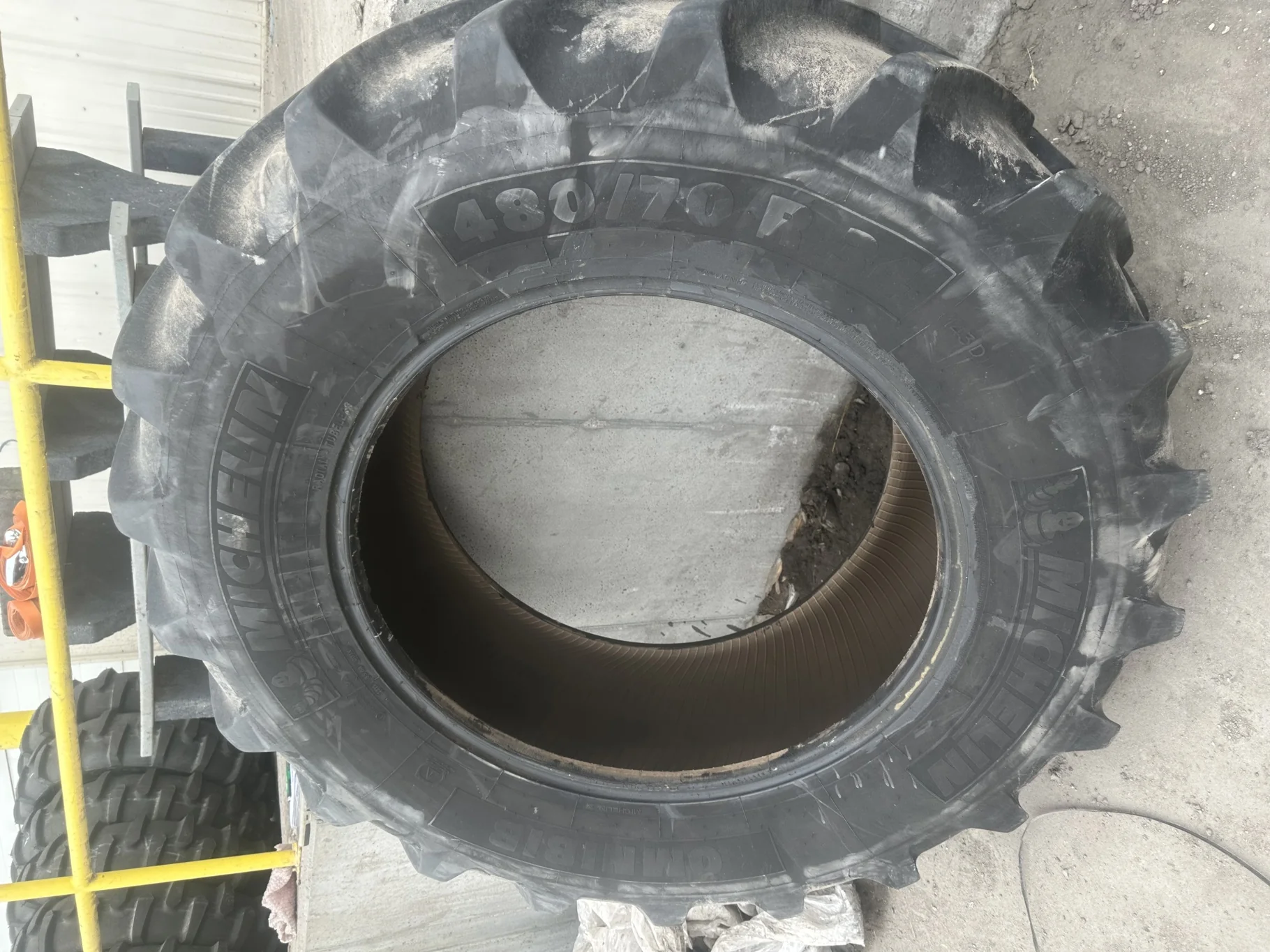 Used 70% 480/70R34 Michelin OmniBib R-1W 143D TL (Some Weathering) - Fair Condition, (lug cuts, stub