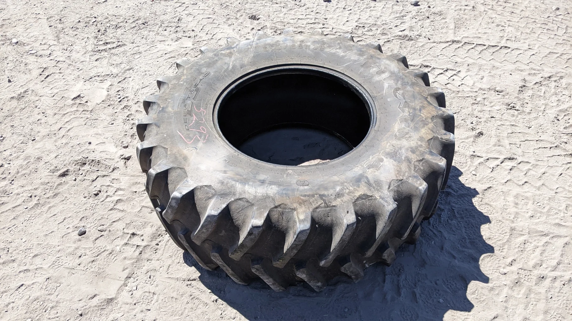 Used 85% 650/85R38 Firestone Radial Deep Tread 23 R-1W 166D TL, (Stubble, Road Wear)