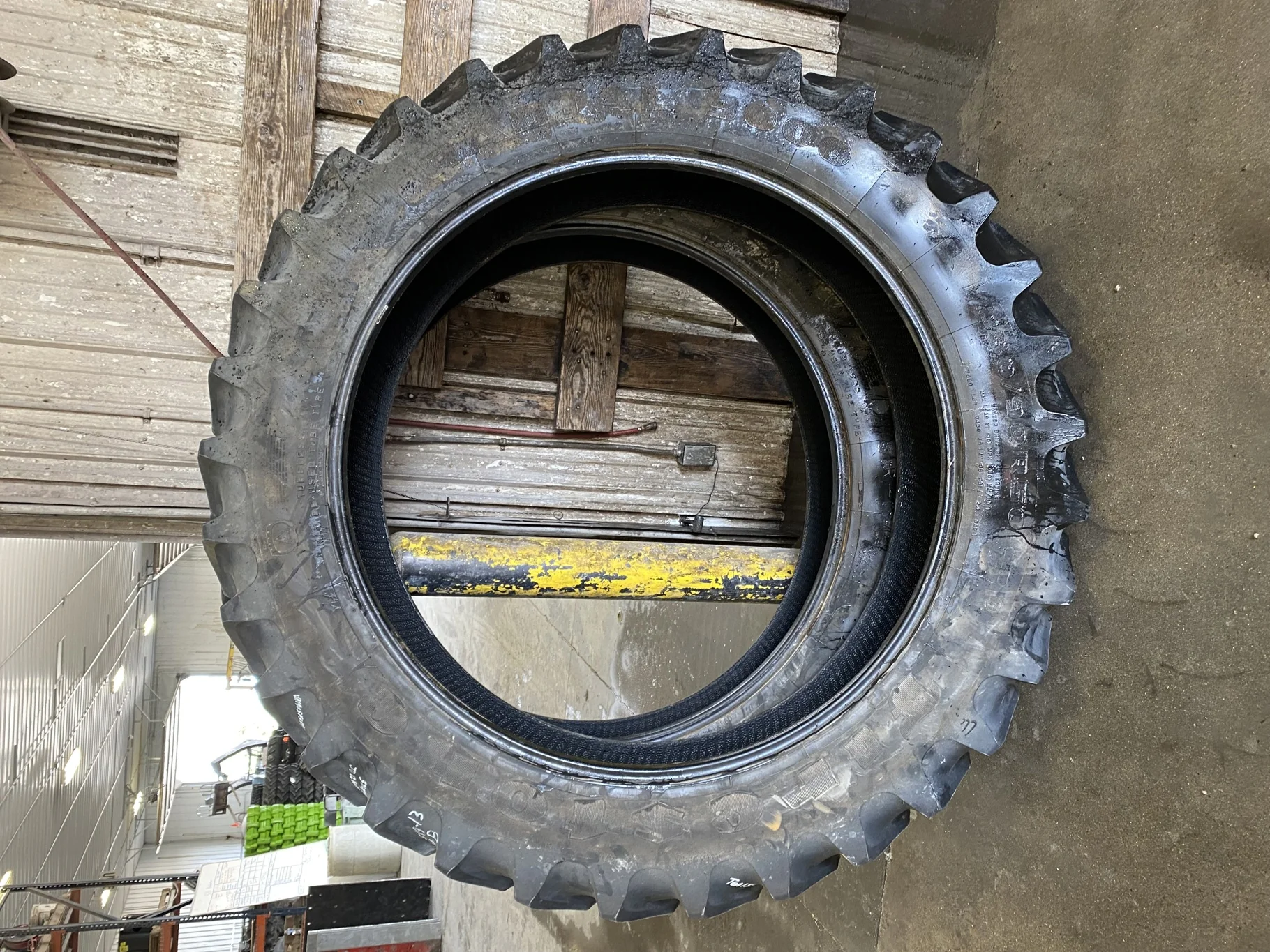 Used 85% 380/90R50 Firestone Radial 9000 R-1W 151B (Lug Cuts)