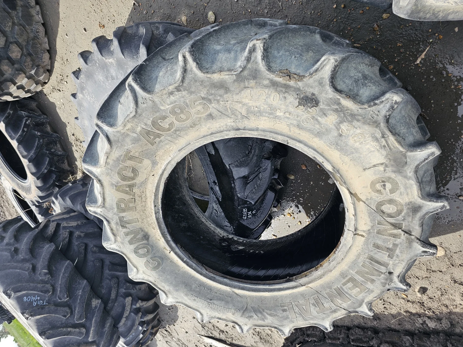 Used 75% 420/85R30 Continental Contract AC85 R-1W (140A8/137B) - Road wear on lugs image 2