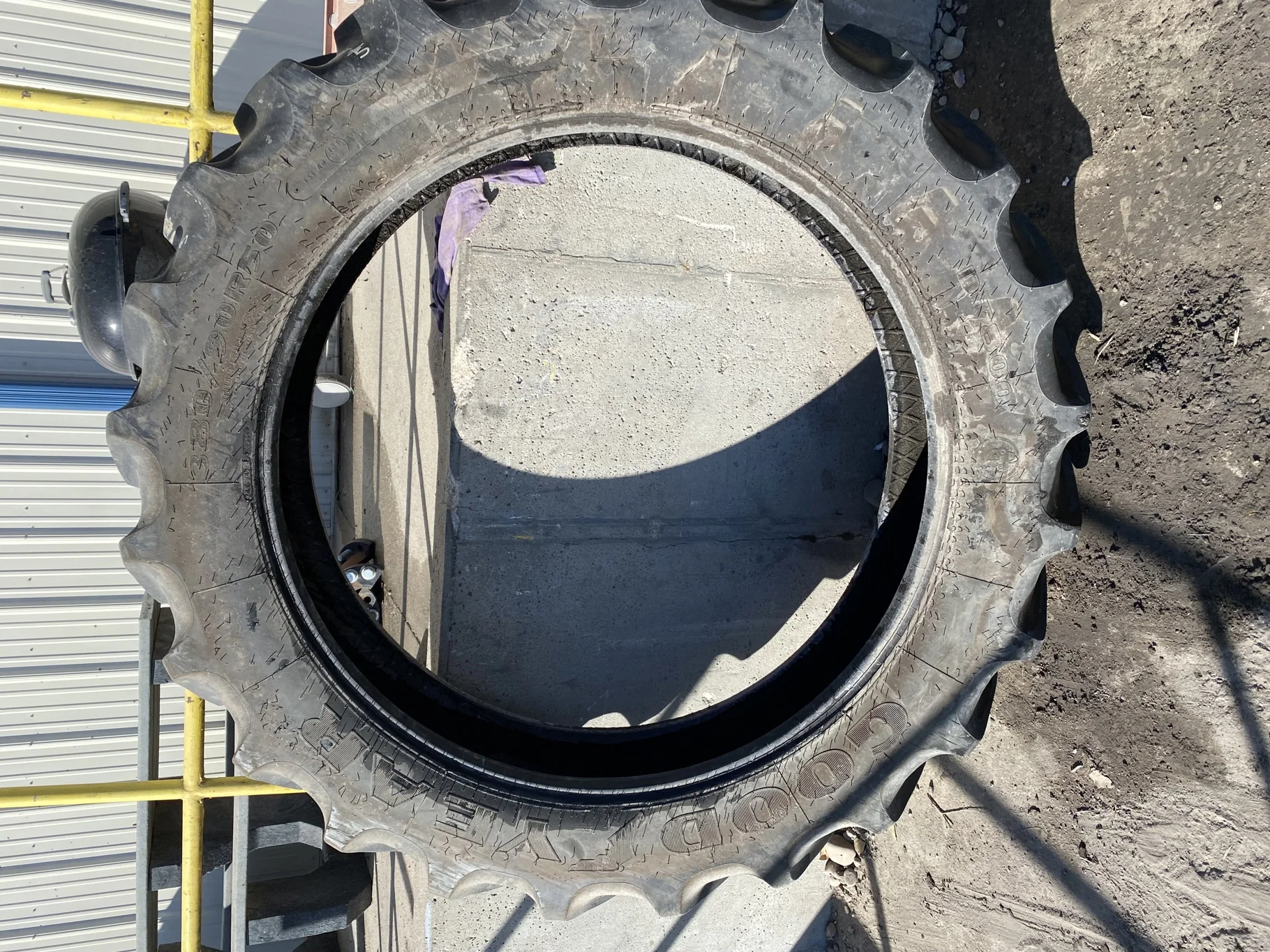 Used 95% 380/90R50 Goodyear Radial DT800 R-1W (151A8) TL - lug stubble, lug cuts