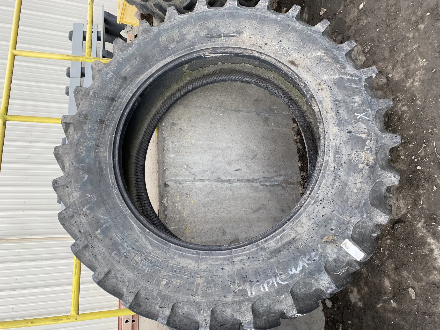 Used 90% 520/85R46 Firestone Radial Deep Tread 23 R-1W (158A8/B) TL (tread wear-BIG cut in b/w lugs image 2