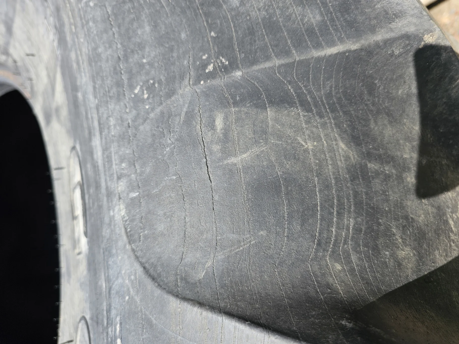 Used 55% 28L-26 Goodyear Dyna Torque II F(12Ply) R-1 TL (Stubble, Lug Cuts, Cuts Between Lugs image 7
