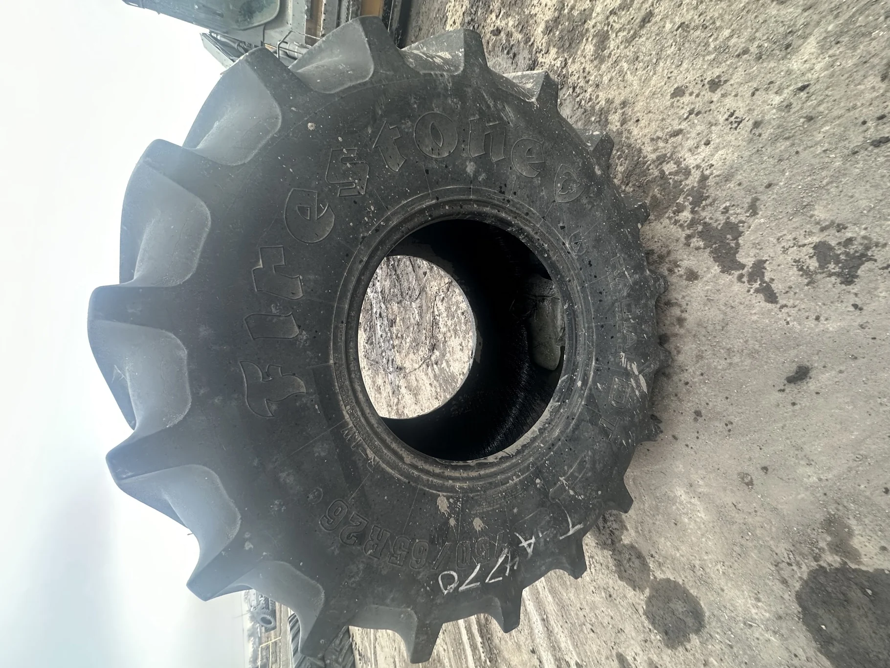 Used 75% 750/65R26 Firestone Radial All Traction DT R-1W 169B TL (Stubble, Uneven Tread Wear, Cuts I image 2
