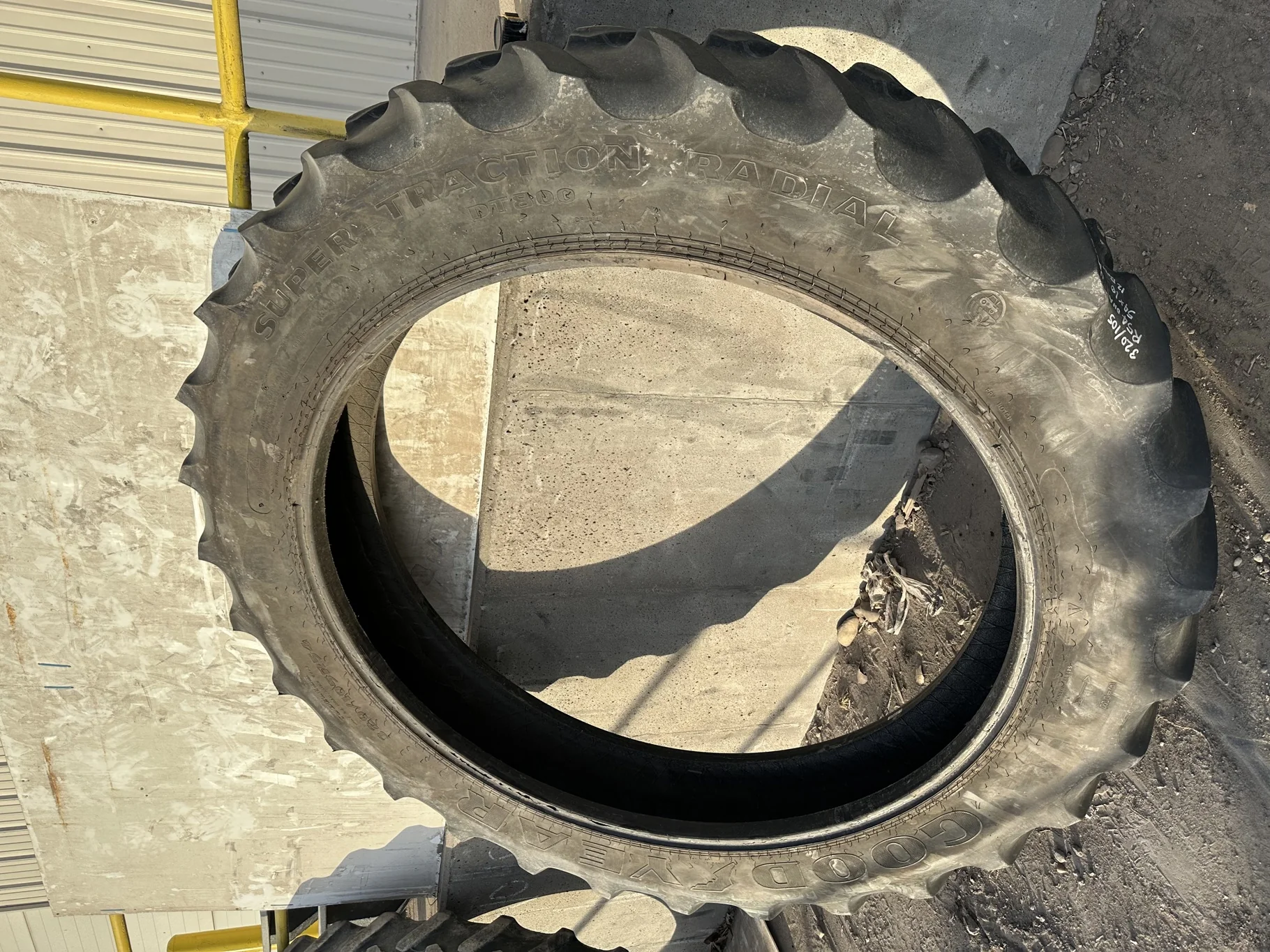 Used 65% 320/105R54 Goodyear Super Traction Radial R-1W (163B) TL (Lug Cuts, Weathering Between Lugs
