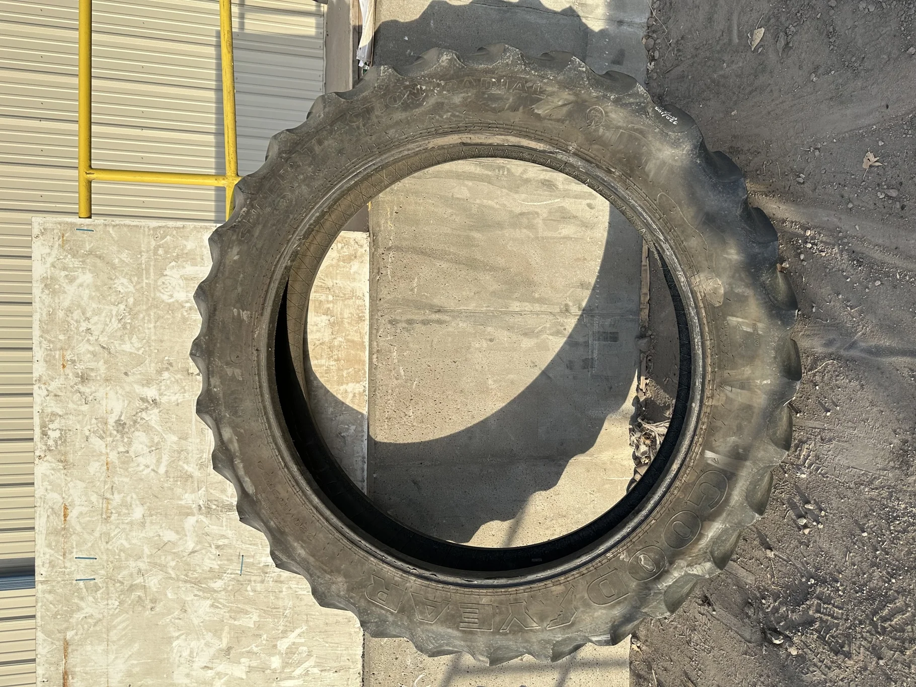 Used 65% 320/105R54 Goodyear Super Traction Radial R-1W (163B) TL (Lug Cuts, Weathering Between Lugs image 2