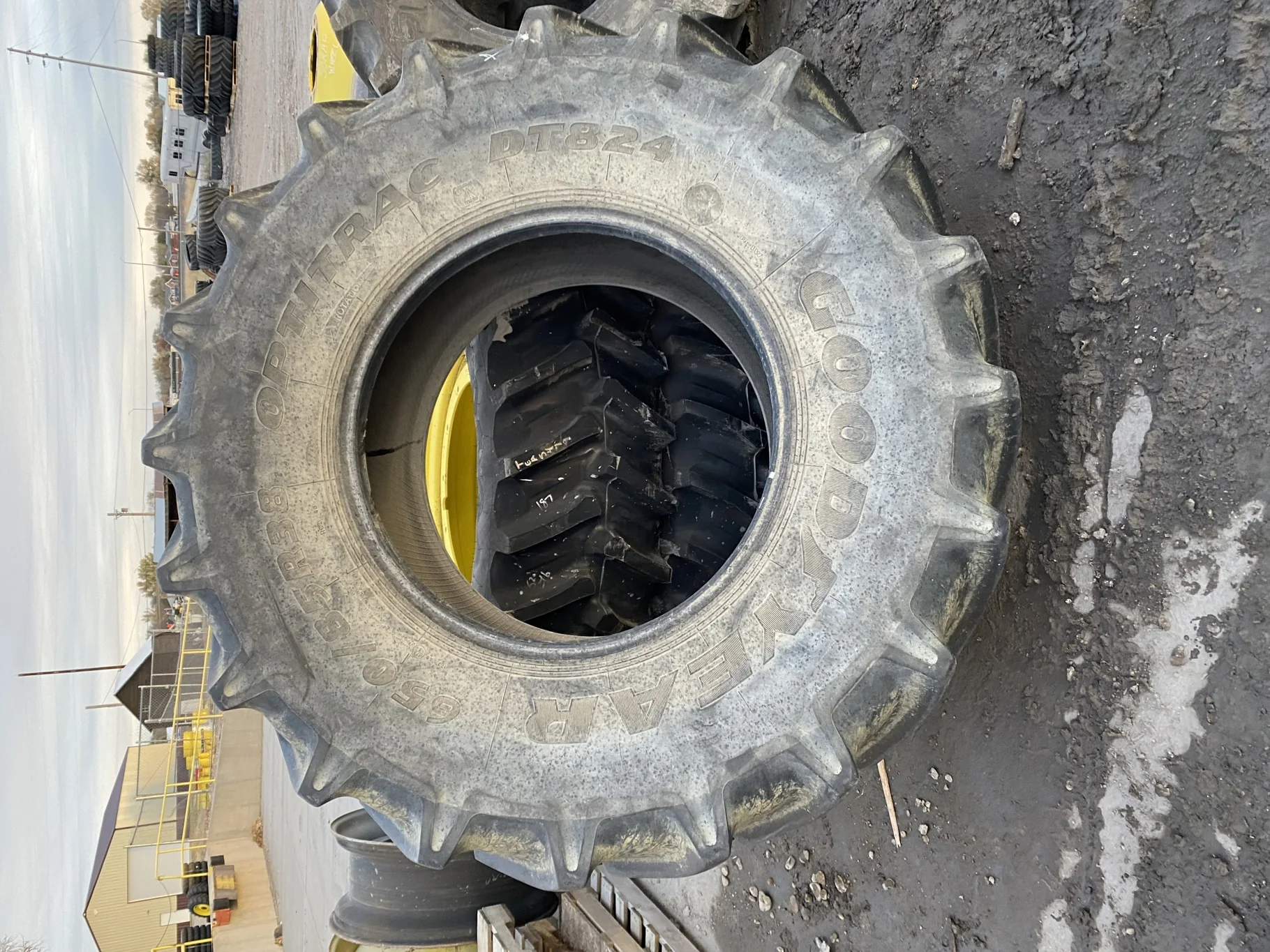 Used 89% 650/85R38 Goodyear Optitrac DT824 (173A8) R1W TL. Sidewall Cuts, Lug Cuts, Stubble