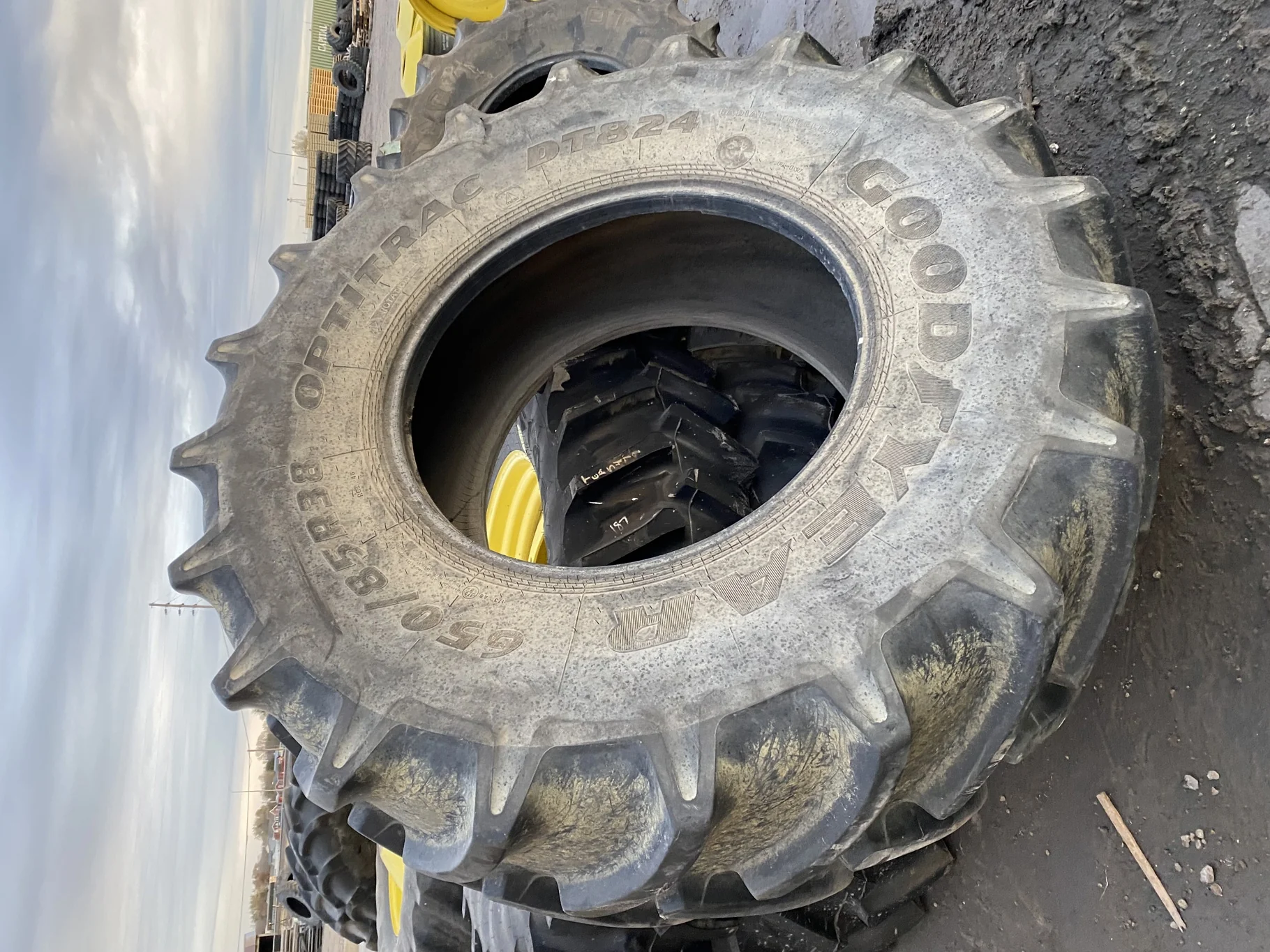 Used 89% 650/85R38 Goodyear Optitrac DT824 (173A8) R1W TL. Sidewall Cuts, Lug Cuts, Stubble image 2
