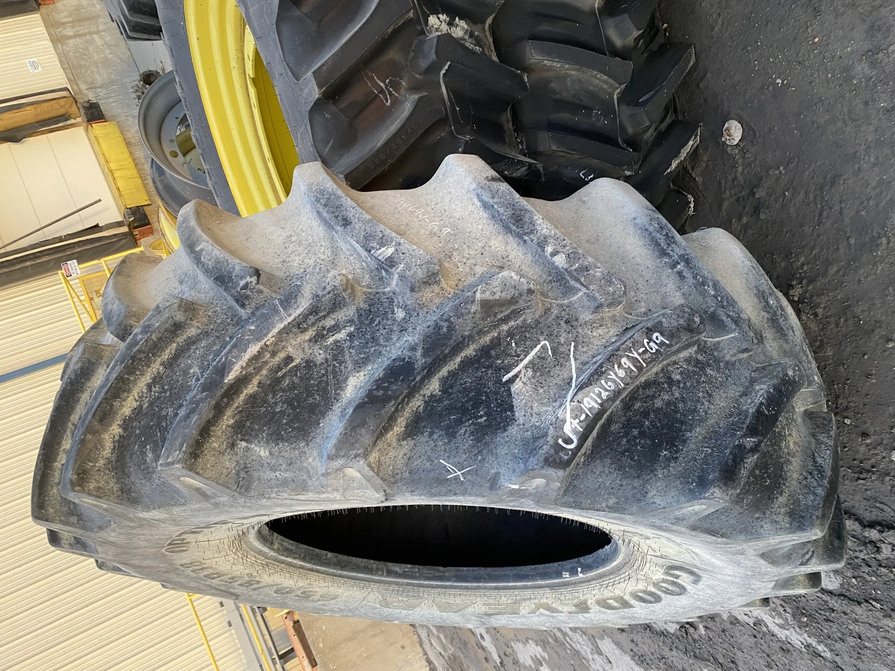 Used 89% 650/85R38 Goodyear Optitrac DT824 (173A8) R1W TL. Sidewall Cuts, Lug Cuts, Stubble image 3