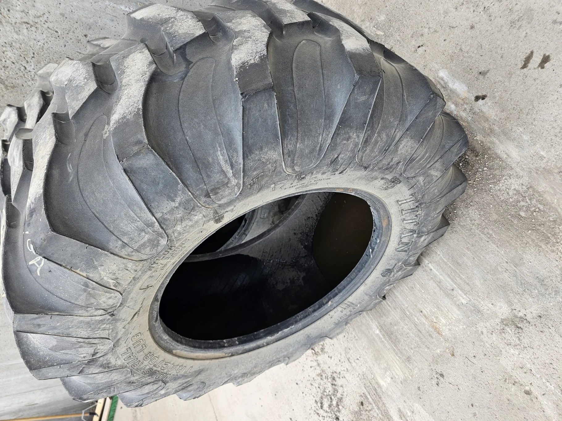 Used 17.5L-24 Titan Industrial Tractor Lug R-4 (8Ply) TL, (Stubble, Lug Damage, Plug)