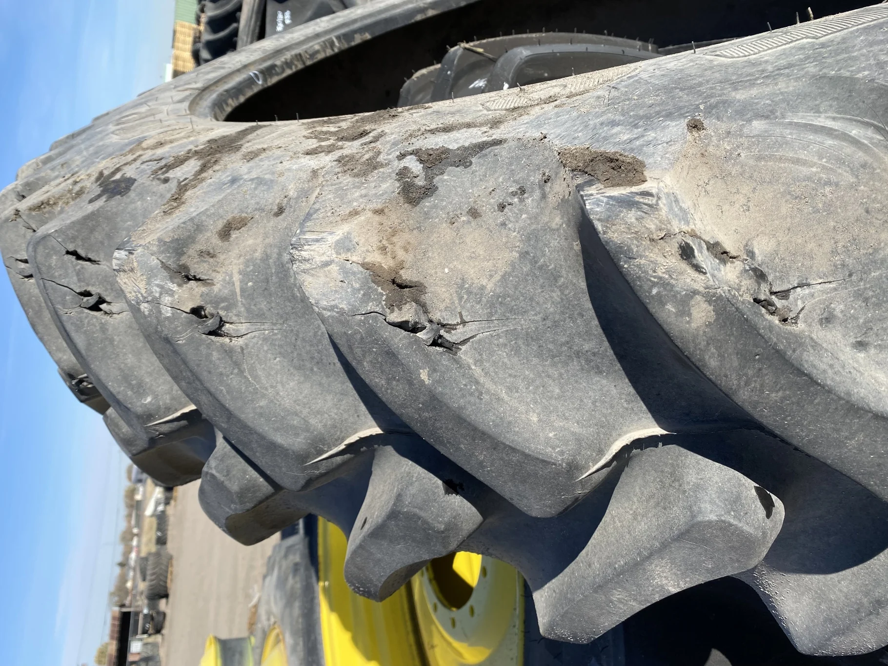 Used 90% 380/90R54 Firestone Radial 9000 R-1W (152B) TL (Lug Cuts, Side wall cuts, Chunks Of Lugs Mi