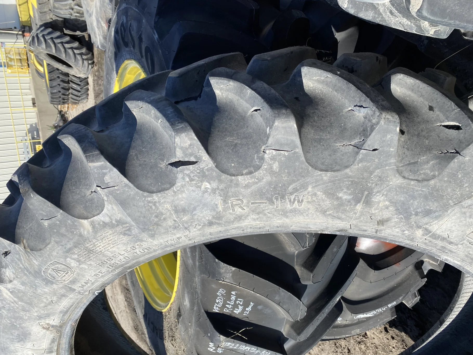 Used 90% 380/90R54 Firestone Radial 9000 R-1W (152B) TL (Lug Cuts, Side wall cuts, Chunks Of Lugs Mi image 2