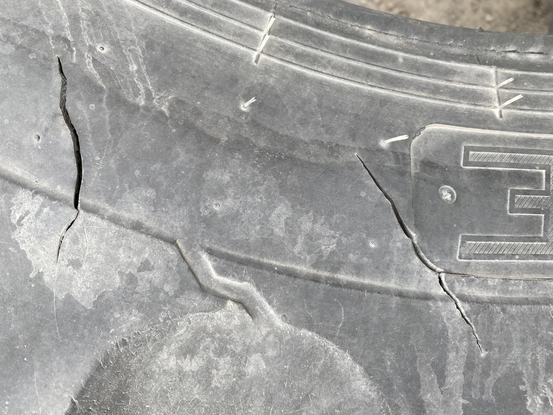 Used 70% 340/85R28 Carlise FSTR 127A8 TL (sidewall cuts, wreathing, road wear, lug cuts) image 5