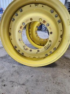 Used 15 x 34 12-16.732-14.640 Titan Heavy Duty Disc Wheel JD Ag Yellow
