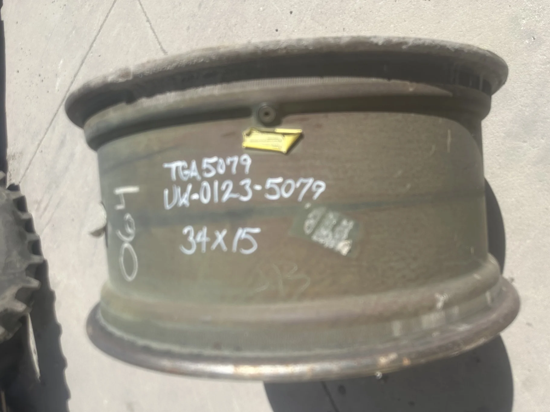Used 15 X 34 John Deere Yellow Waffle Wheel (3 Bolt) (24-29.25) 8.25" BS image 3