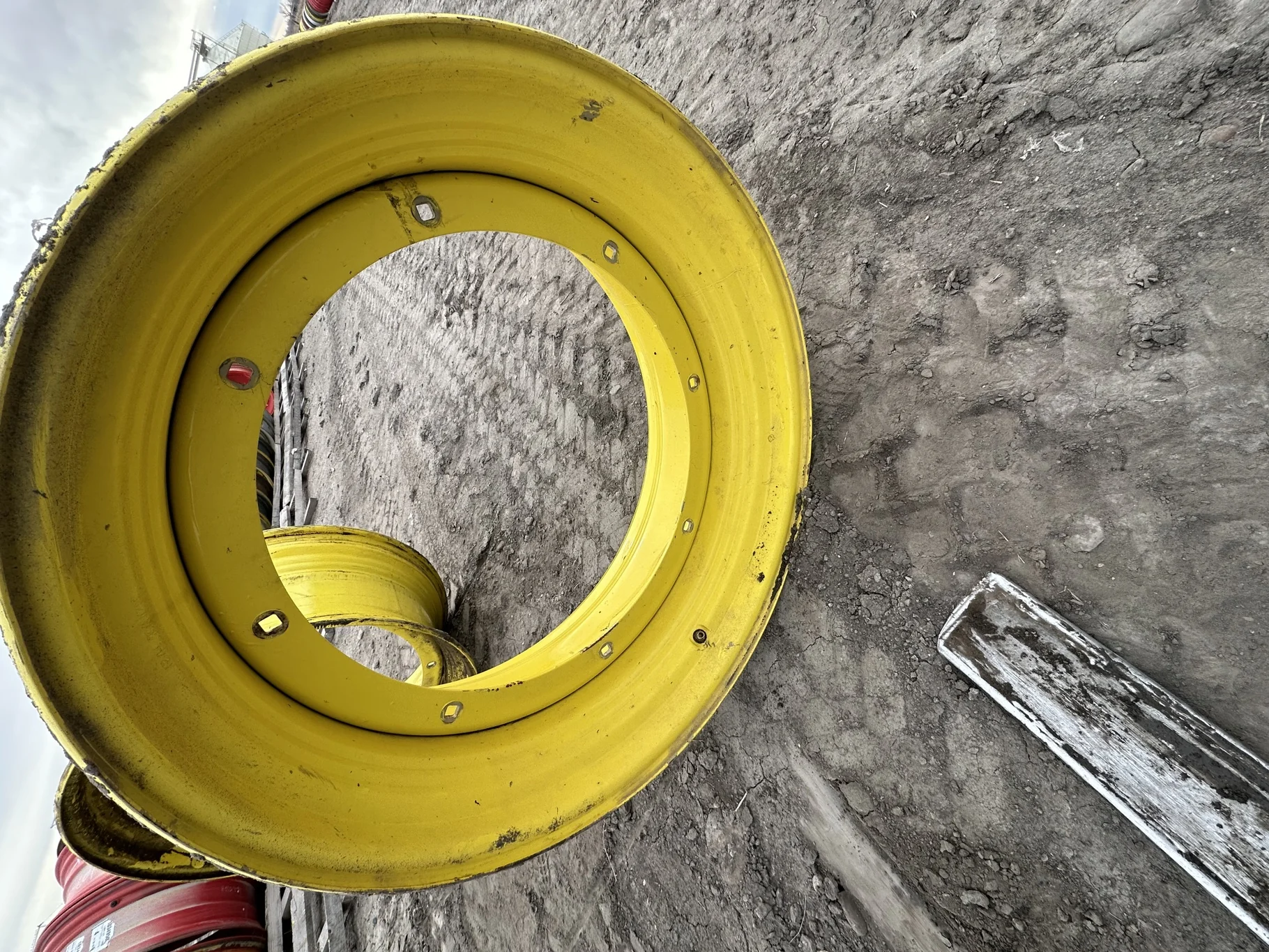 Used 15 X 34 John Deere Yellow 8 Bolt Mannheim - Good Condition  _x000D_
(scratches)
