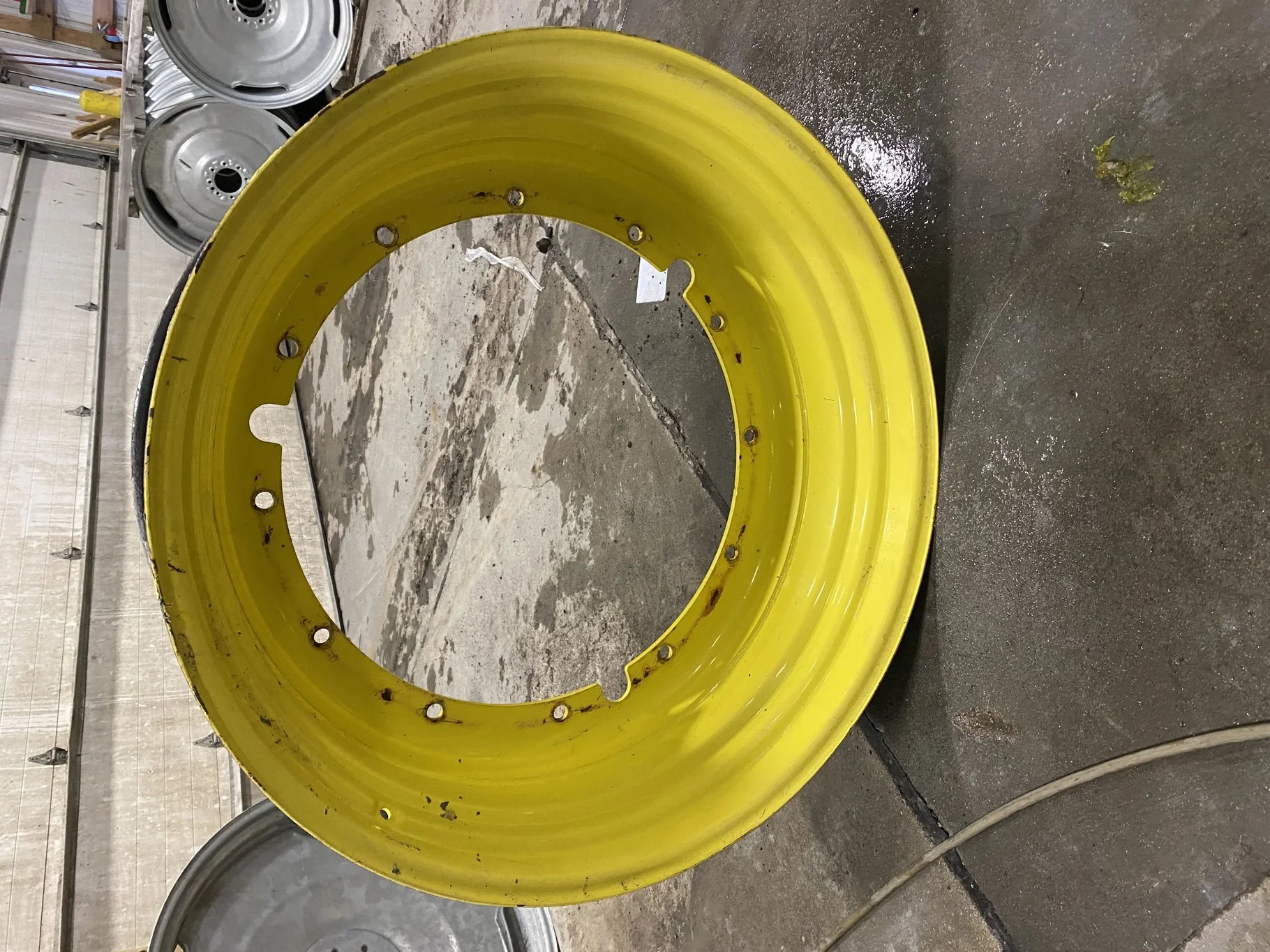 Used 16 X 42 John Deere Yellow 12 Bolt Stub Disc - Fair Condition 
(Scratches, Gashes, Rust Spots)