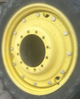 Used 12 X 38 John Deere Stub disc wheel With 12 Bolt center (12-16.732-14.625) (faded paint, Scratch