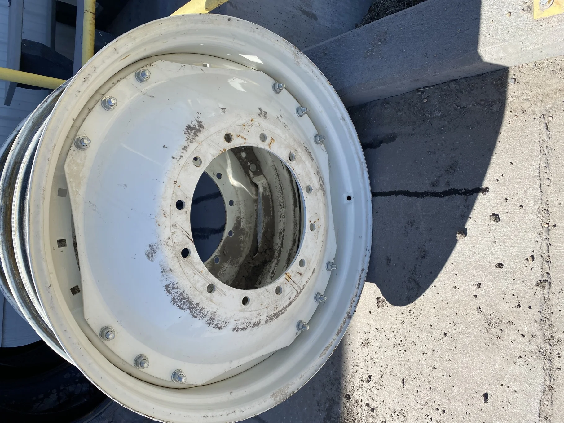 Used 12 X 38 NH Waffle Wheel (3 Bolt) with a 38" NH White 12 Bolt (.75) Waffle Center (Gashes, Rust)