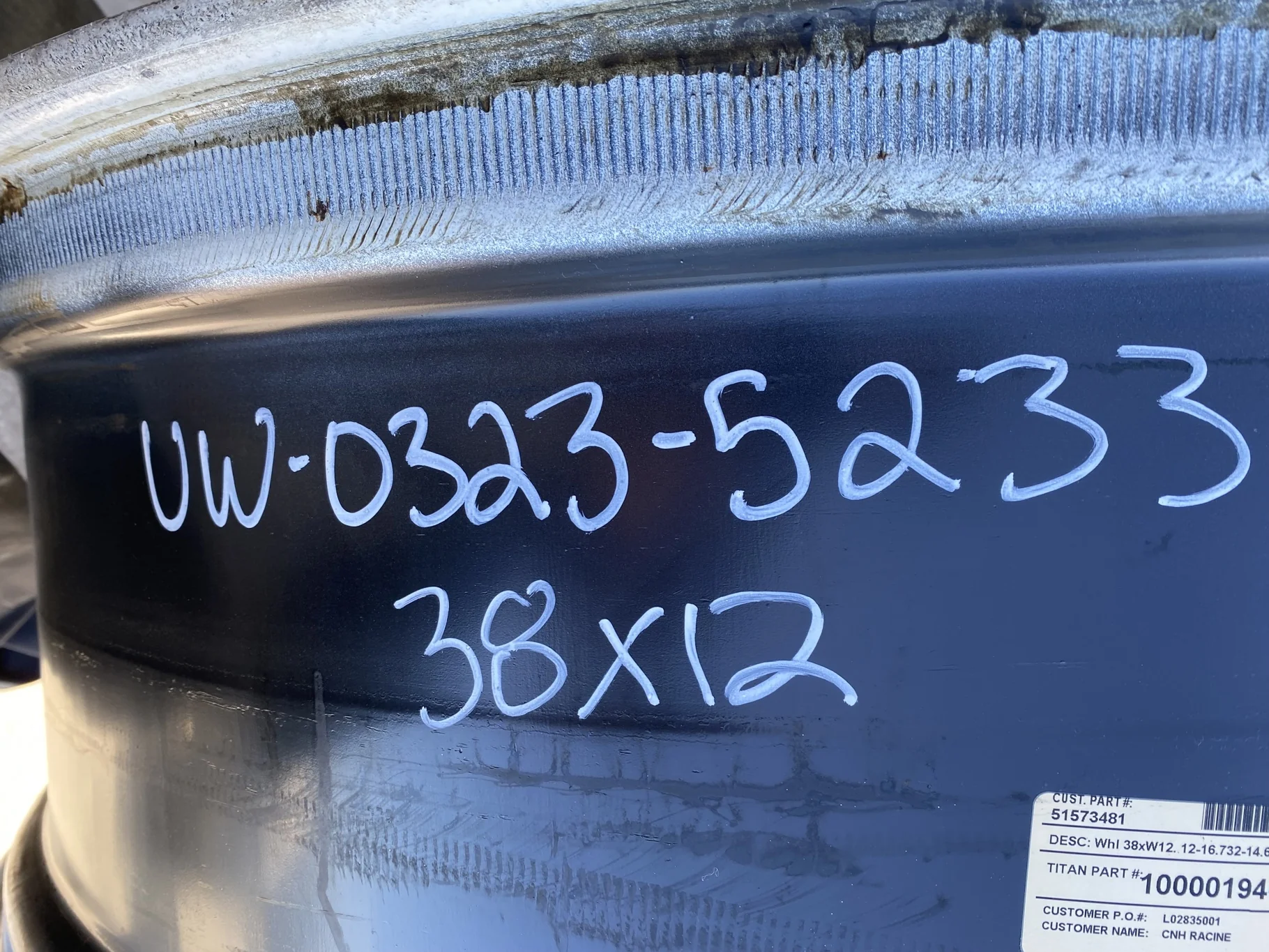 Used 12 X 38 NH Waffle Wheel (3 Bolt) with a 38" NH White 12 Bolt (.75) Waffle Center (Gashes, Rust) image 9