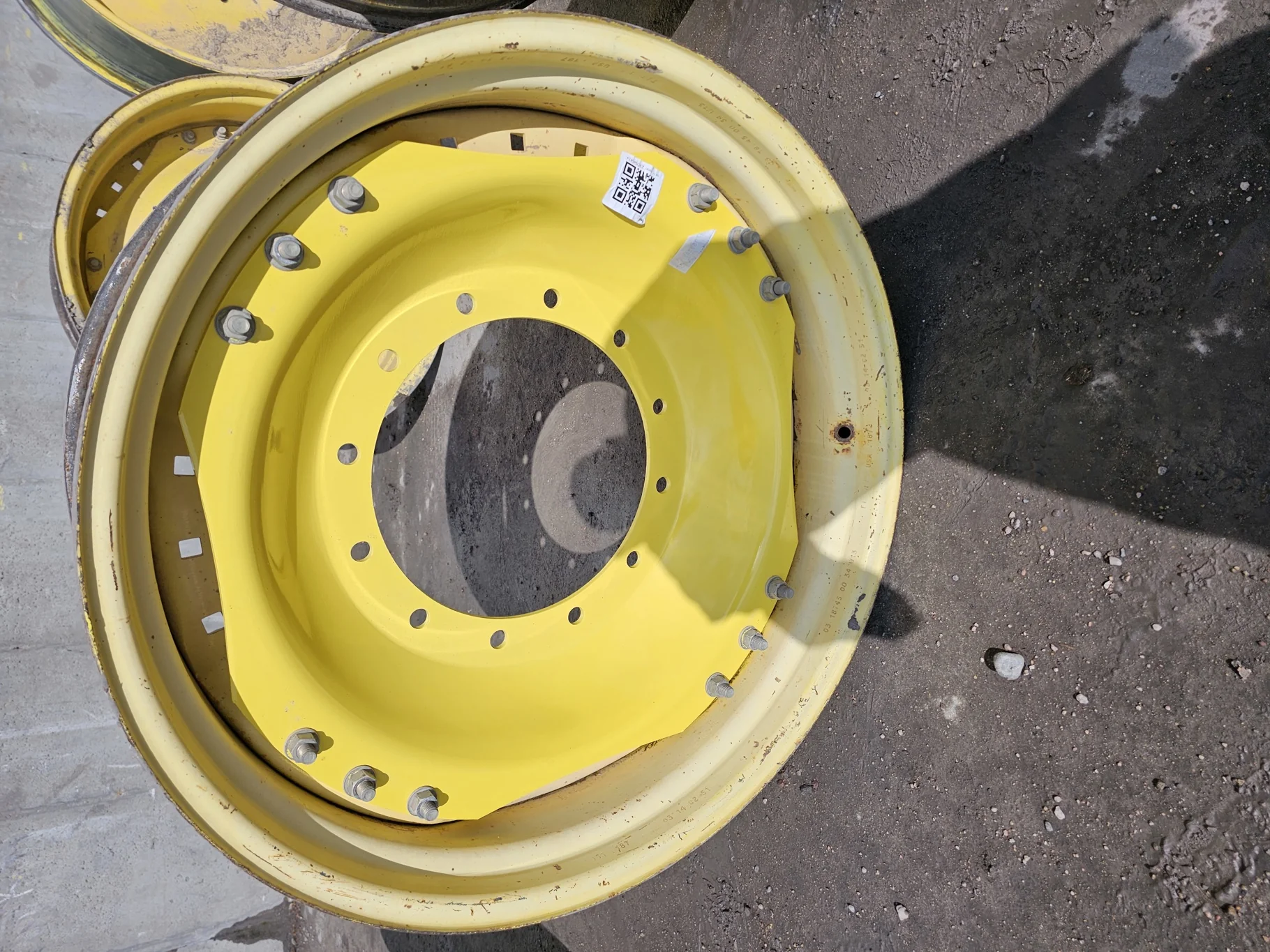 Used 13 X 34 John Deere Yellow Waffle Wheel (3 Bolt) (16-29.25) 8.25" BS with a 34" John Deere Yello image 2