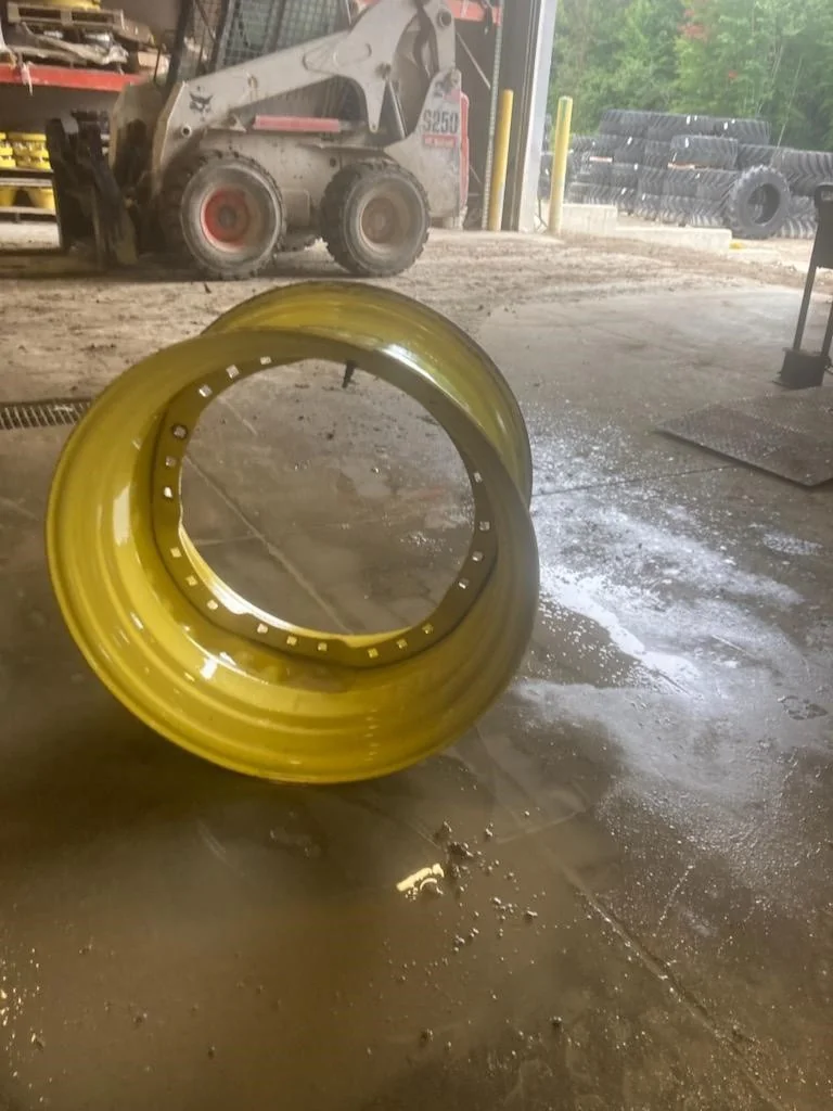 Used 18 X 28 John Deere Yellow Waffle Wheel (3 Bolt)