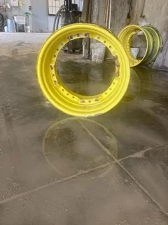 Used 18 X 28 John Deere Yellow Waffle Wheel (3 Bolt) image 2